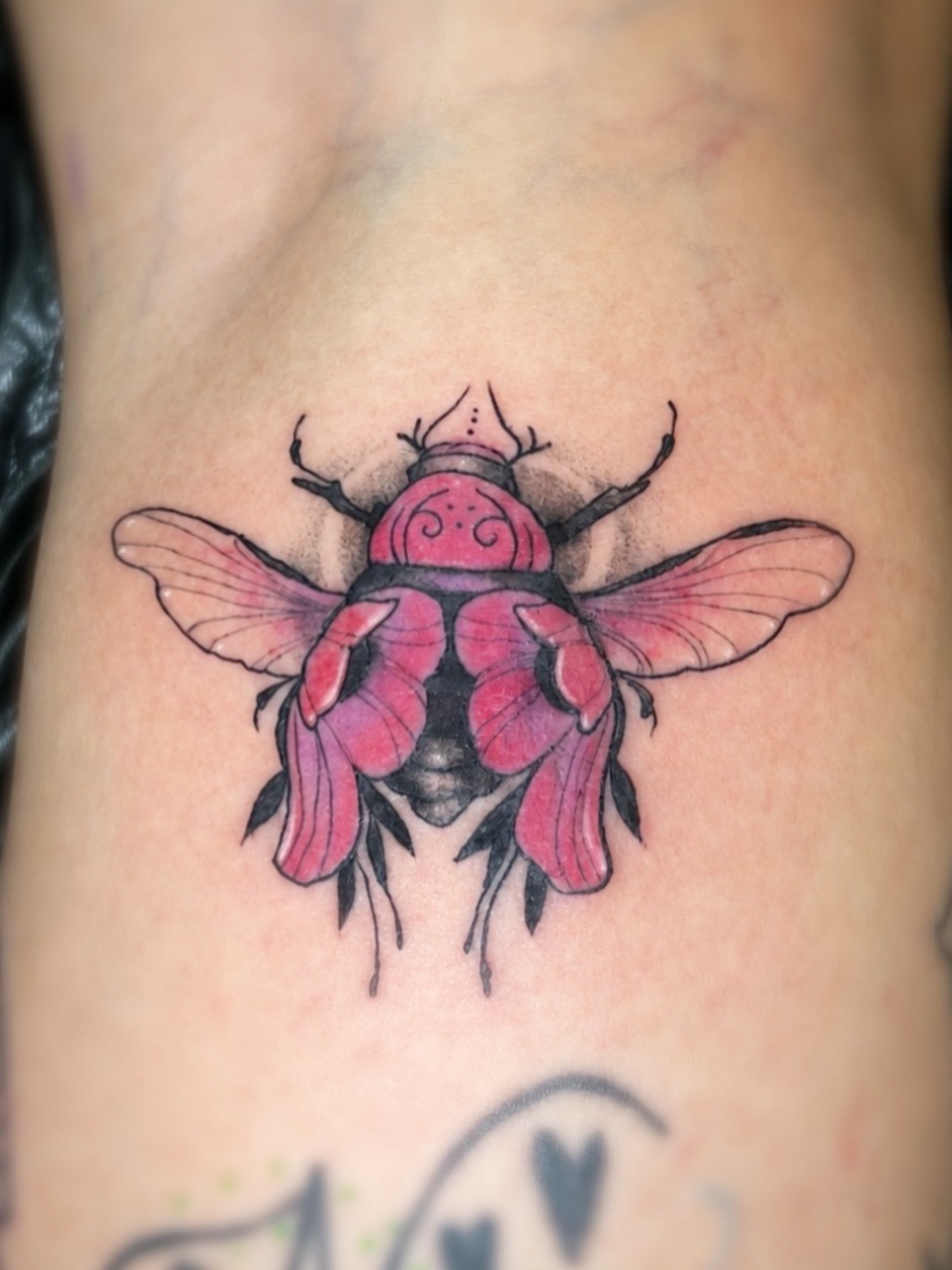 Tattoo by @amber_noir_tattoo — realism, watercolor