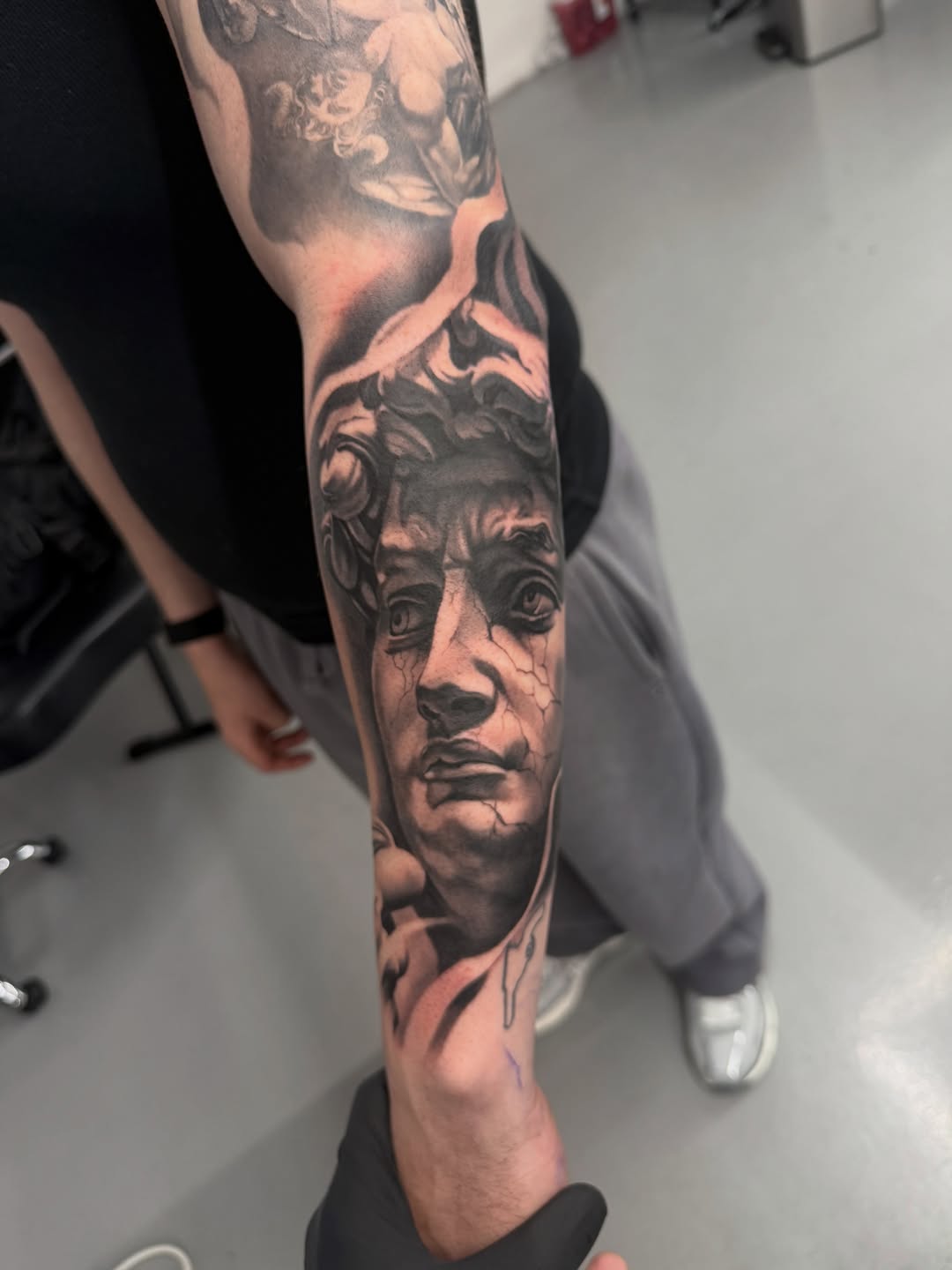 Tattoo by @gionastarace_tattoo — realism, black_and_grey