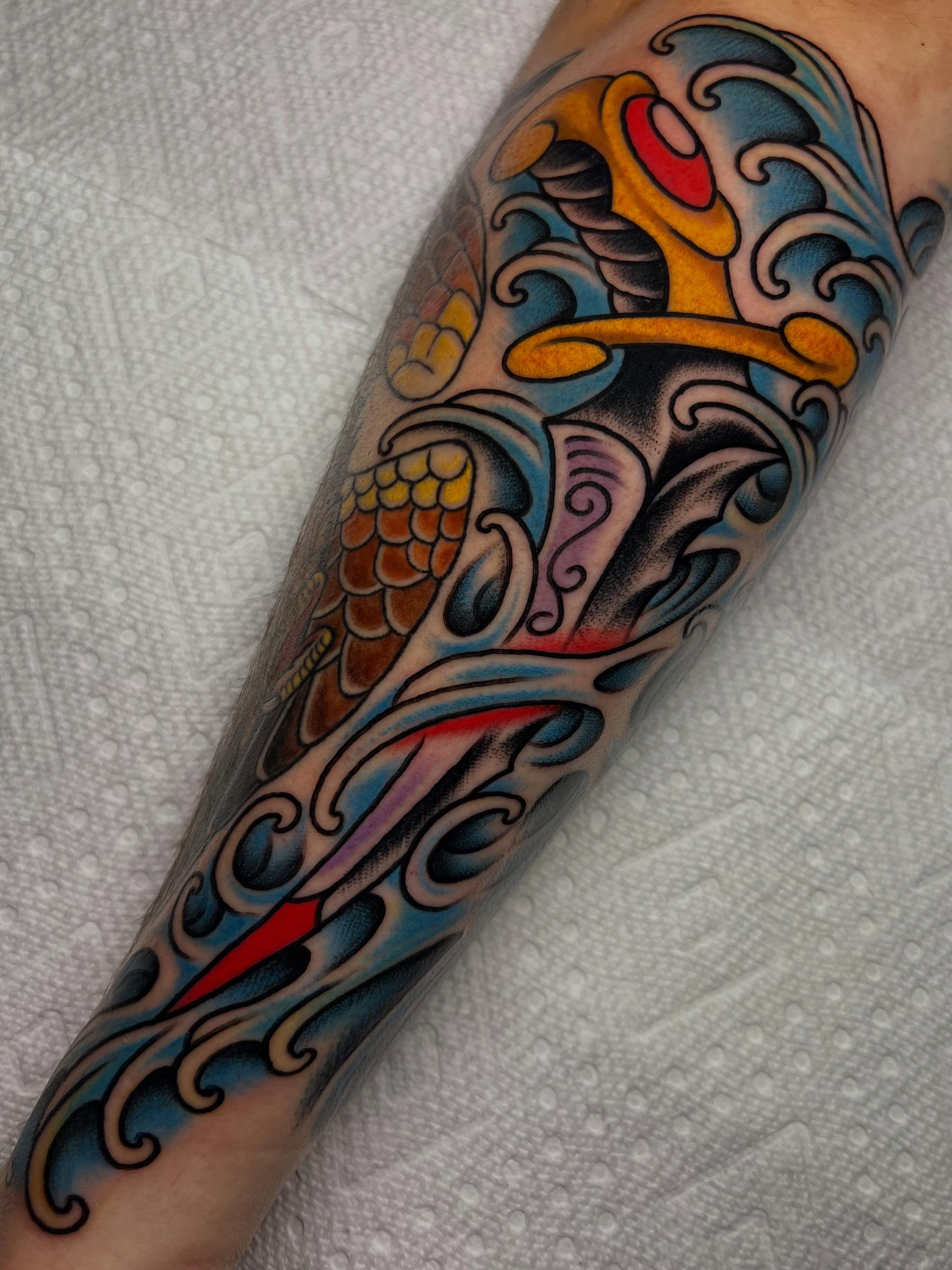 Koi fish American traditional tattoo on the forearm by ᴍᴀᴛᴛ ᴀʟᴇxᴀɴᴅᴇʀ