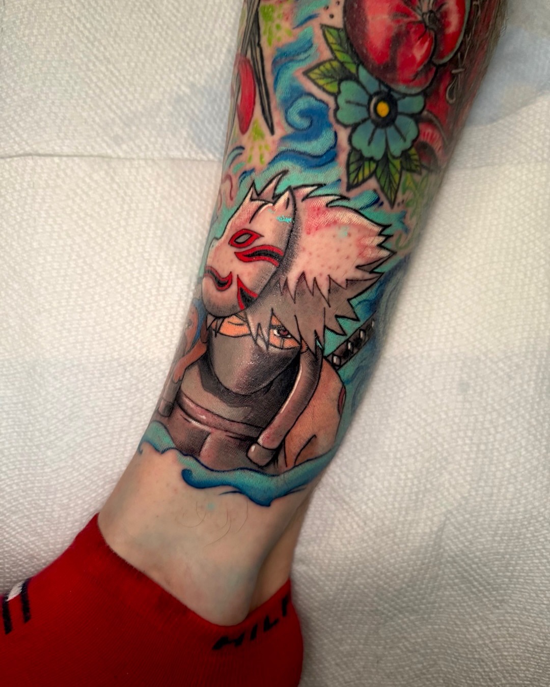 Anime character anime tattoo on the forearm by Paul Endres Jr