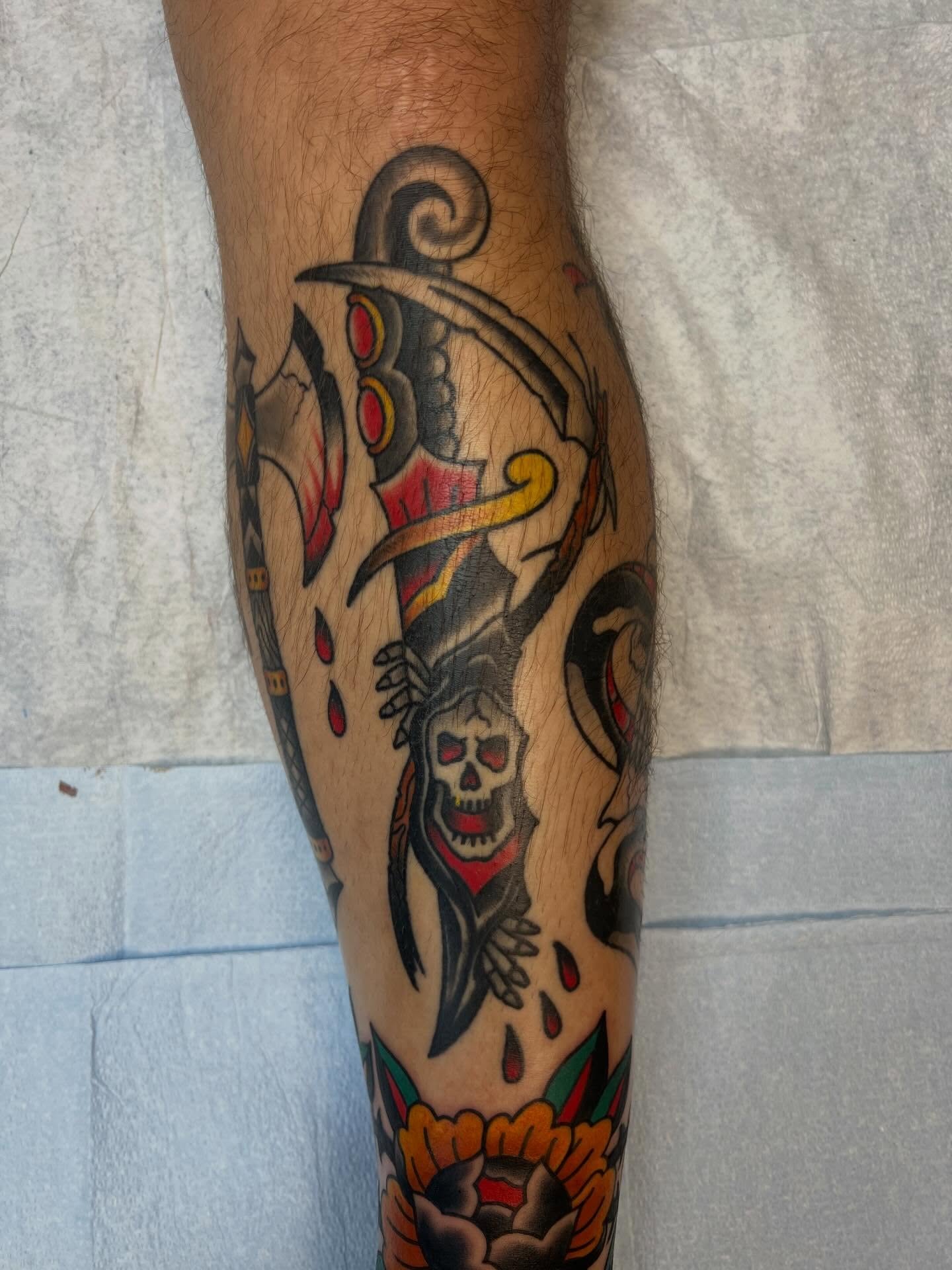 Skull and dagger American traditional tattoo on the forearm by Tyler Van Pelt