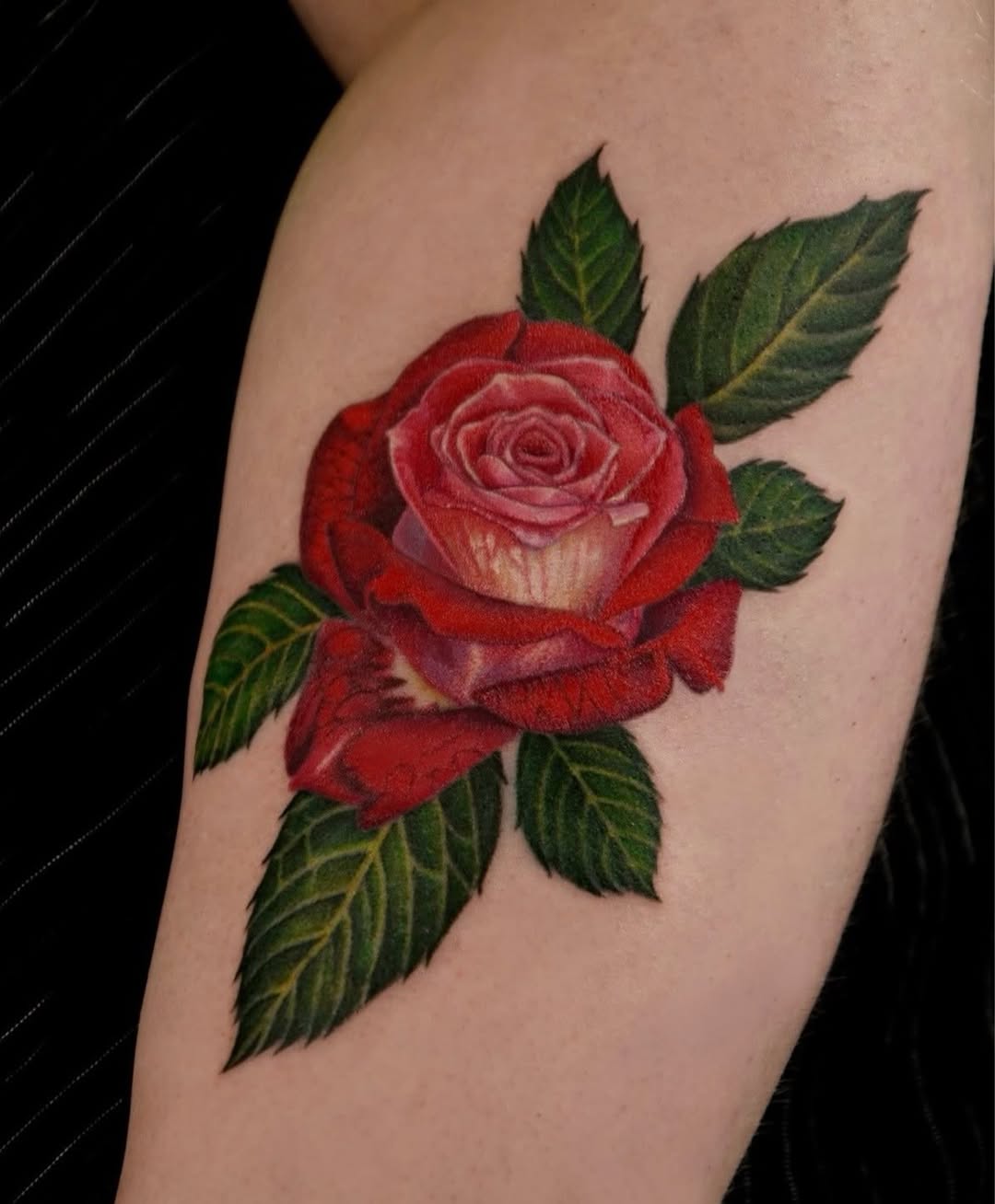Red rose with leaves neo-traditional tattoo on the forearm by ๐ก๐ฎ๐ป๐ฐ๐ โง ๐ก๐ฌ๐ ๐ง๐๐ง๐ง๐ข๐ข ๐๐ฅ๐ง๐๐ฆ๐งโง