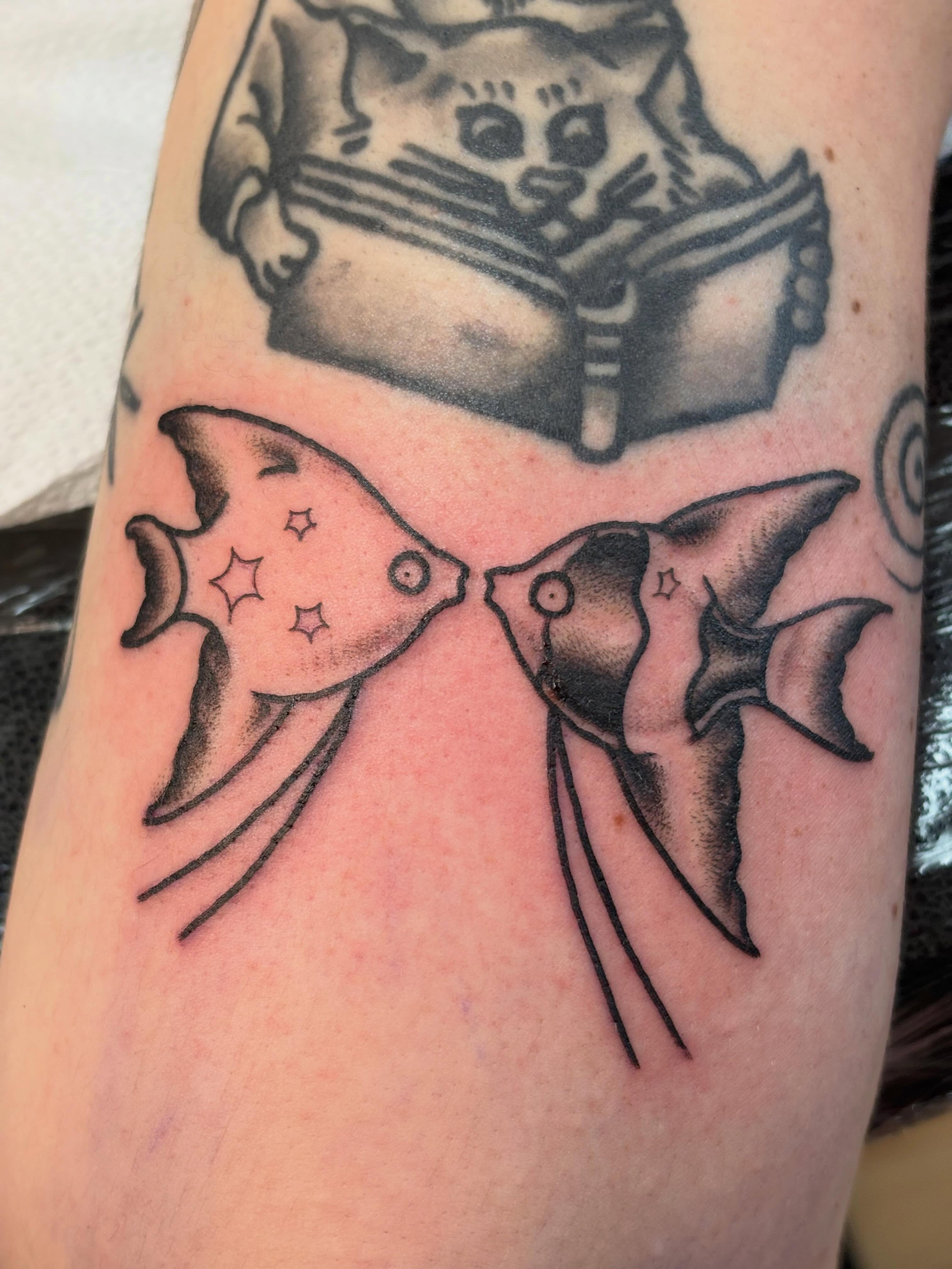 Angelfish black and grey tattoo on the forearm by Nick Tate