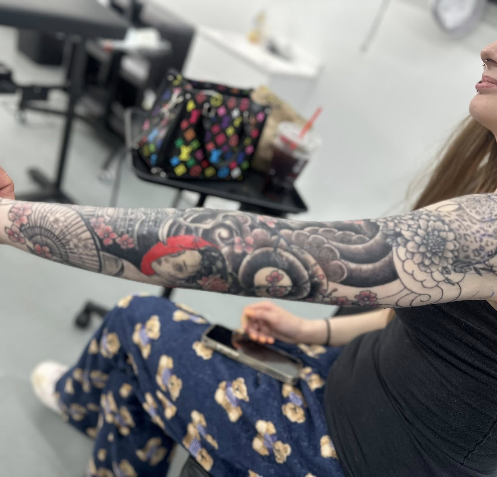 Geisha and floral japanese irezumi tattoo on the forearm by Brian Lambert