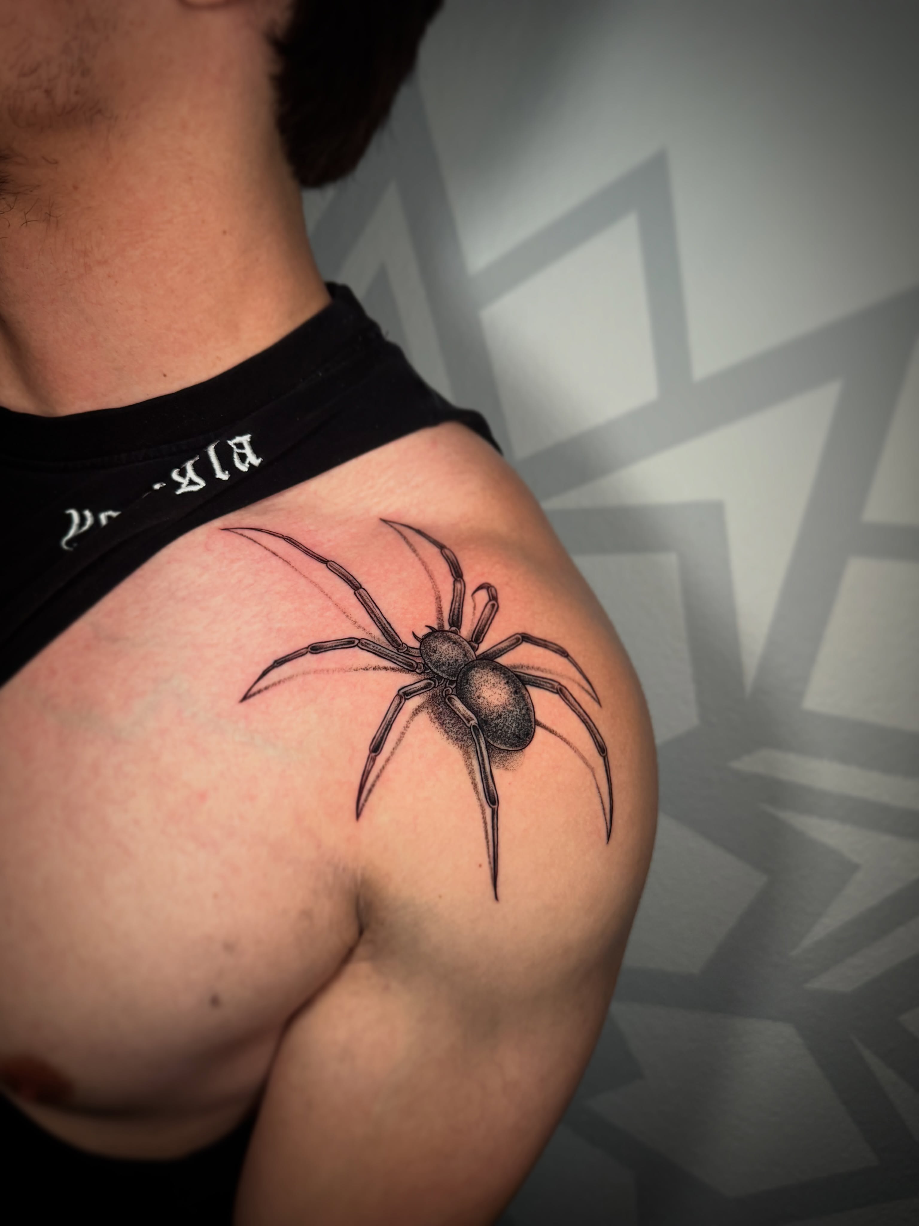 Spider black and grey tattoo on the shoulder by Las Vegas Tattoo Artist