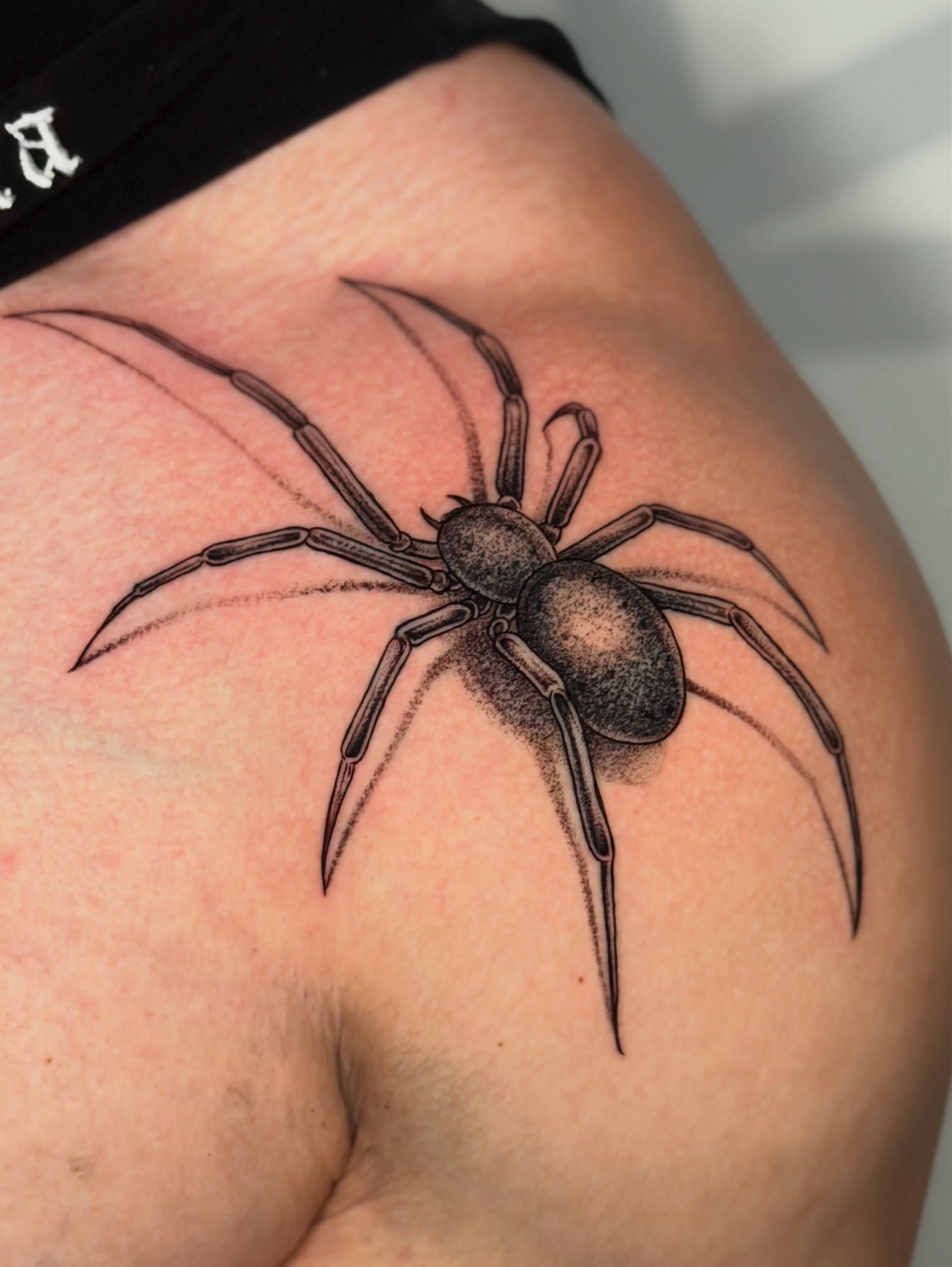 Spider black and grey tattoo on the shoulder by Las Vegas Tattoo Artist