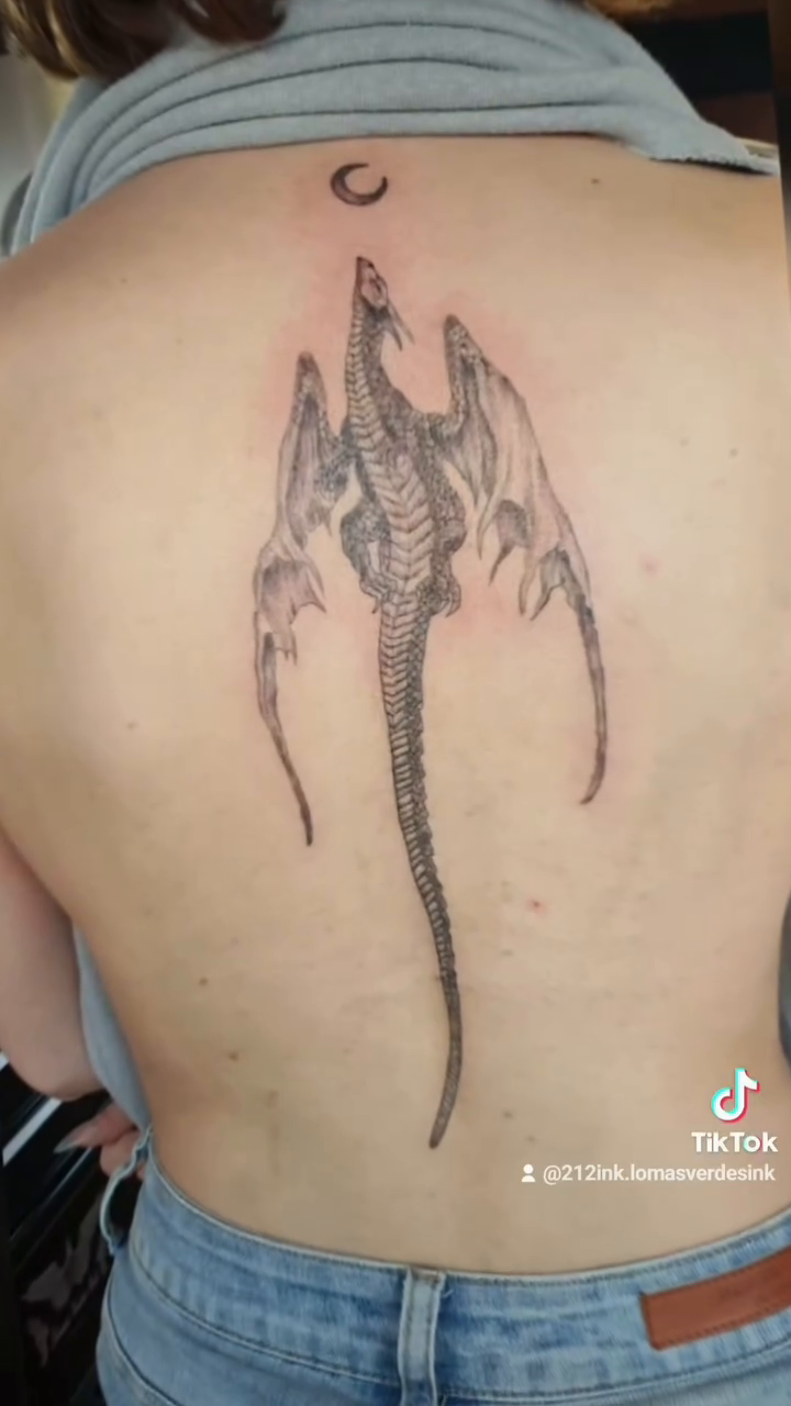 Dragon on back blackwork tattoo on the back by Tatuajes Betto Ink Tattoo