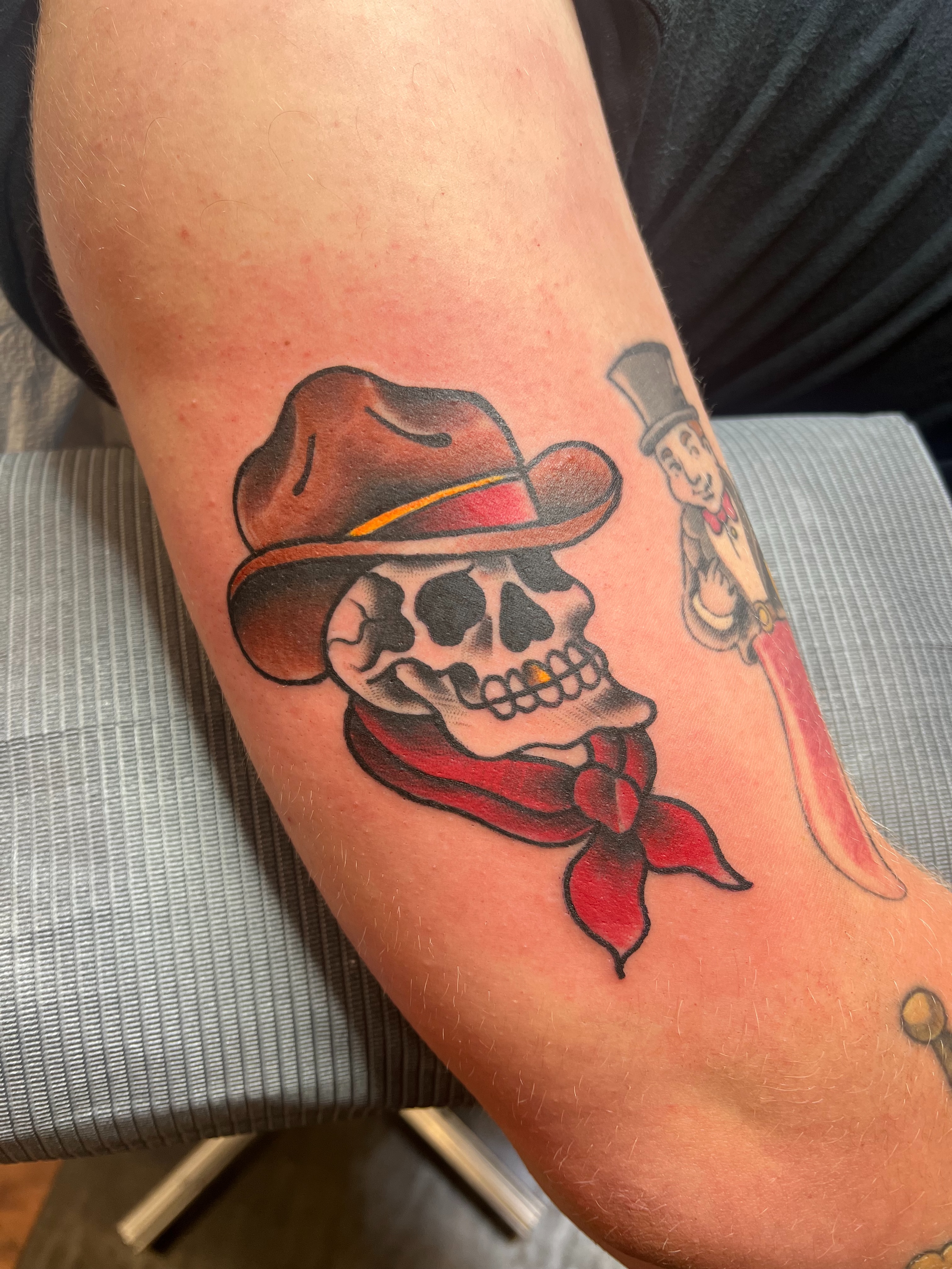 Cowboy skull American traditional tattoo on the forearm by Fizzy Jizzles, Worcester, England