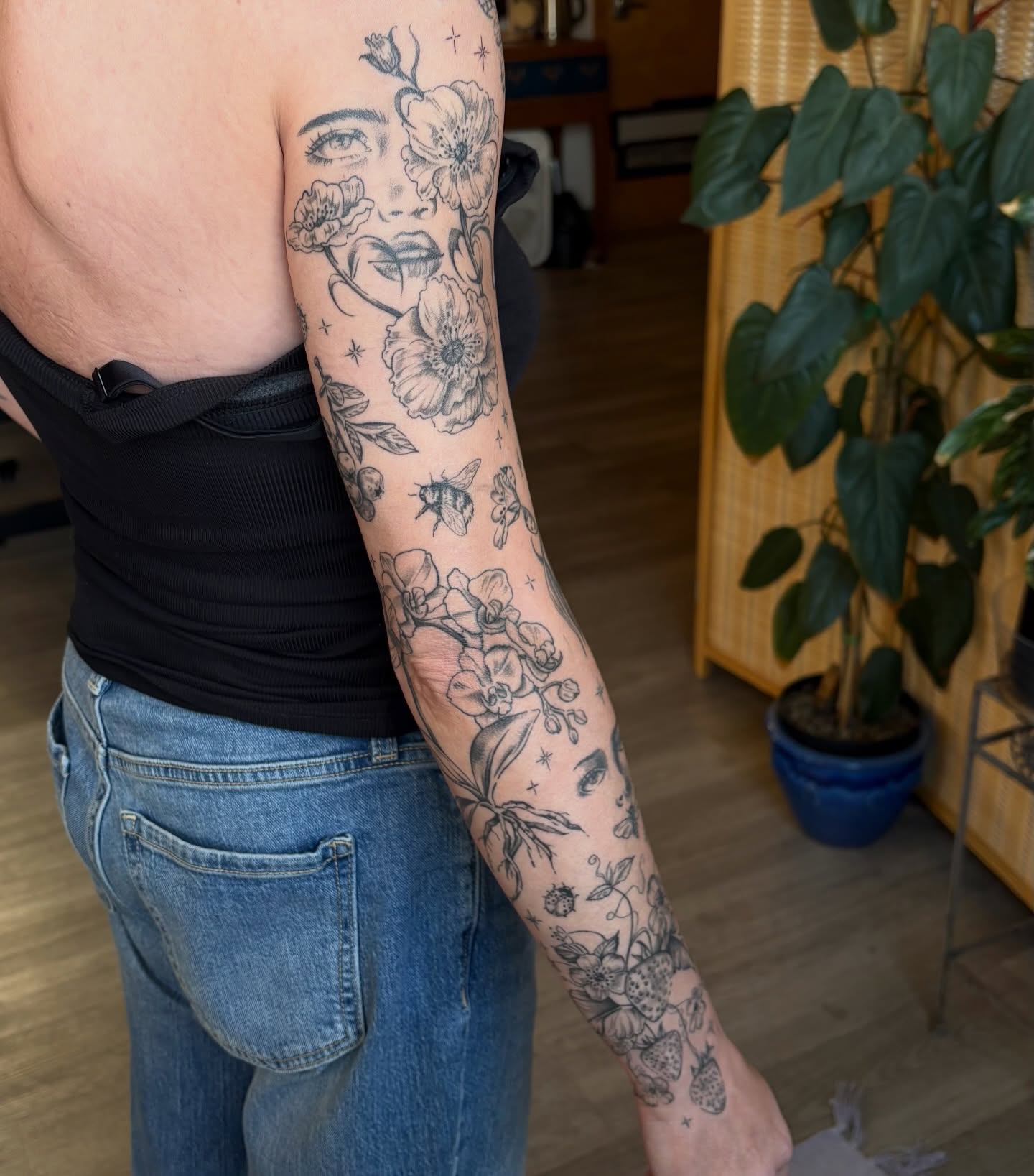 Floral portrait realism tattoo on the forearm by emery ♡ slc utah tattoo artist