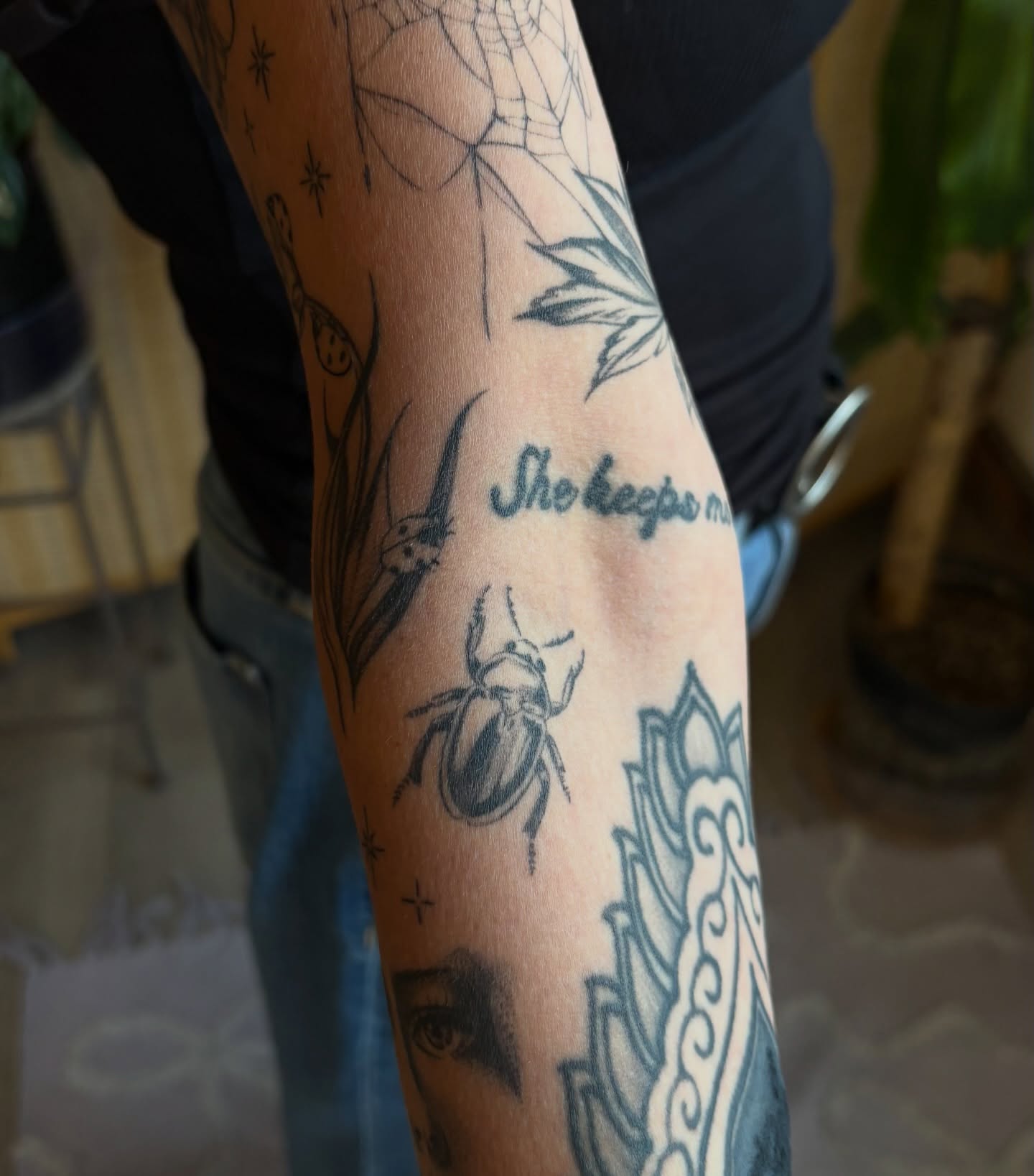 Insect and spider web black and grey tattoo on the forearm by emery ♡ slc utah tattoo artist