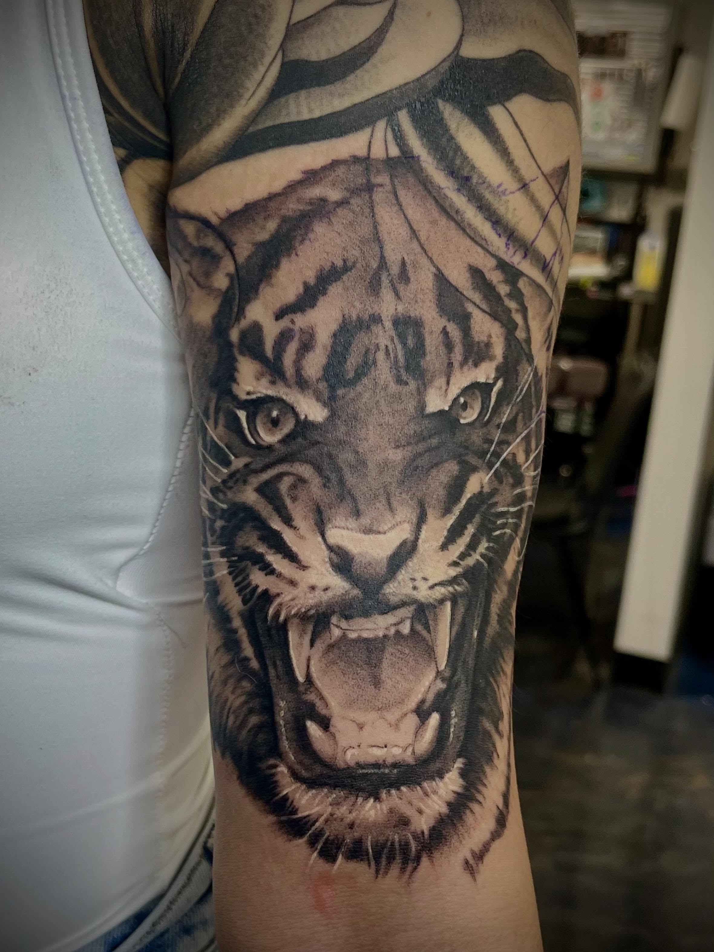 Tattoo by @necro_comicon — realism, black_and_grey