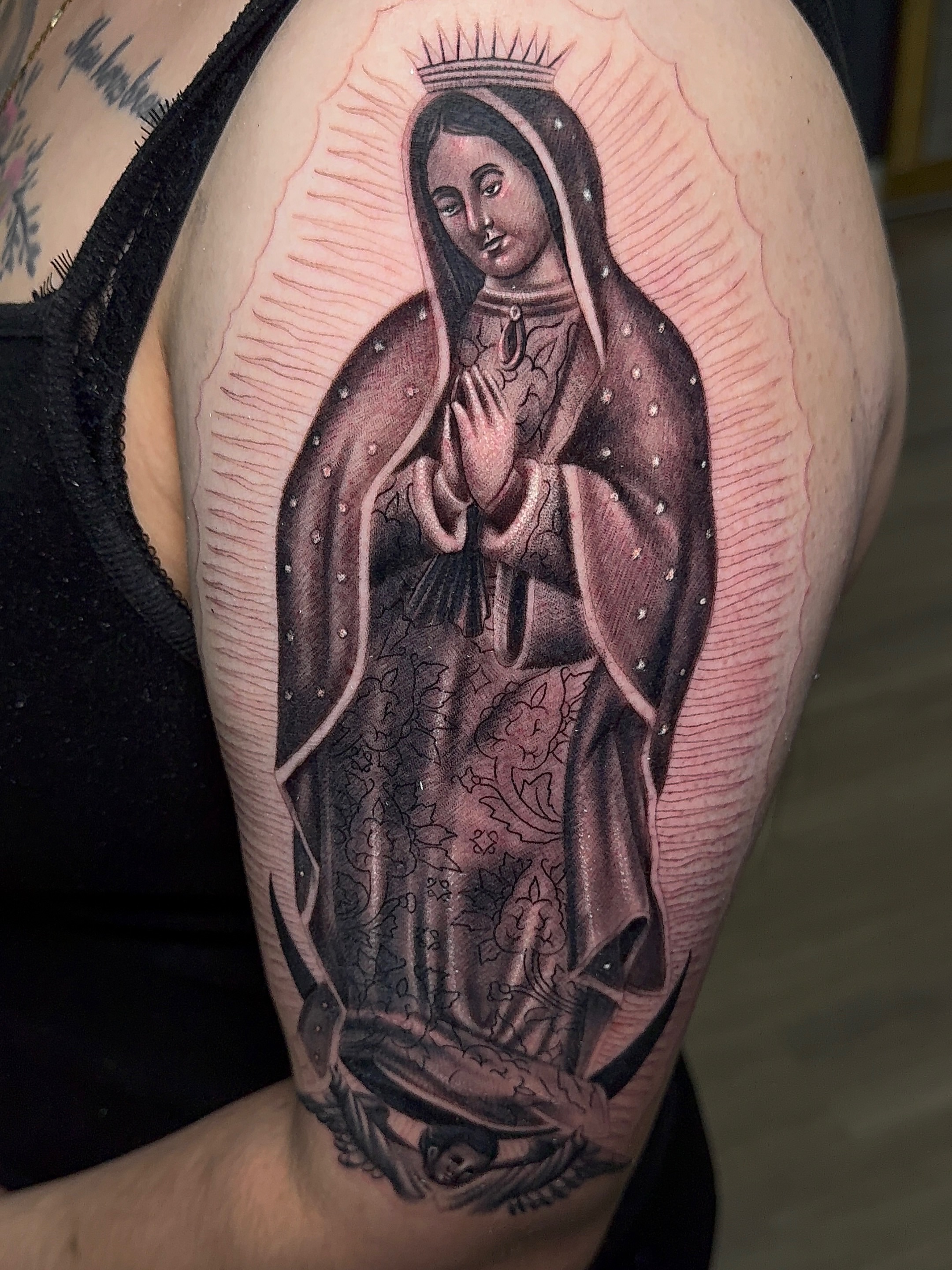 Our Lady of Guadalupe realism tattoo on the upper arm by Dallas tattoo artist, Dallas, Texas