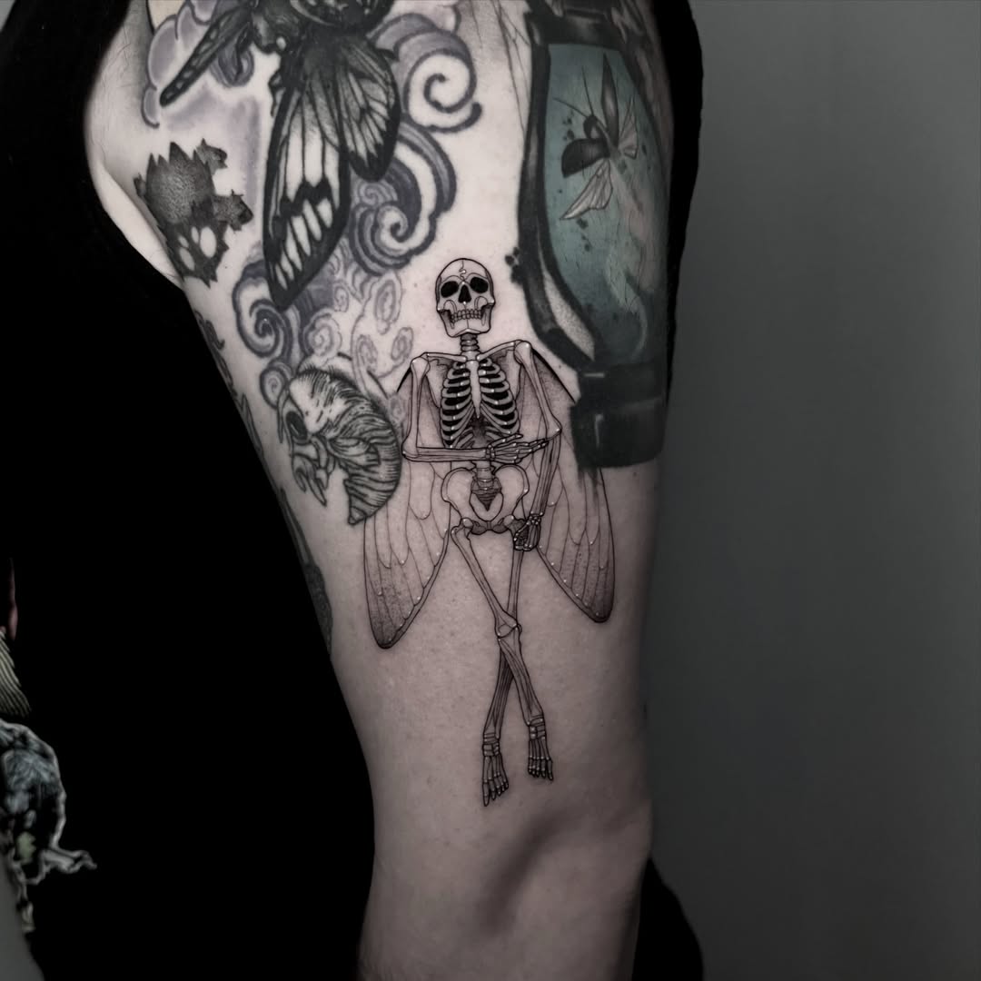 Skeleton with wings realism tattoo on the forearm by ɪᴠᴏɴɴᴇ