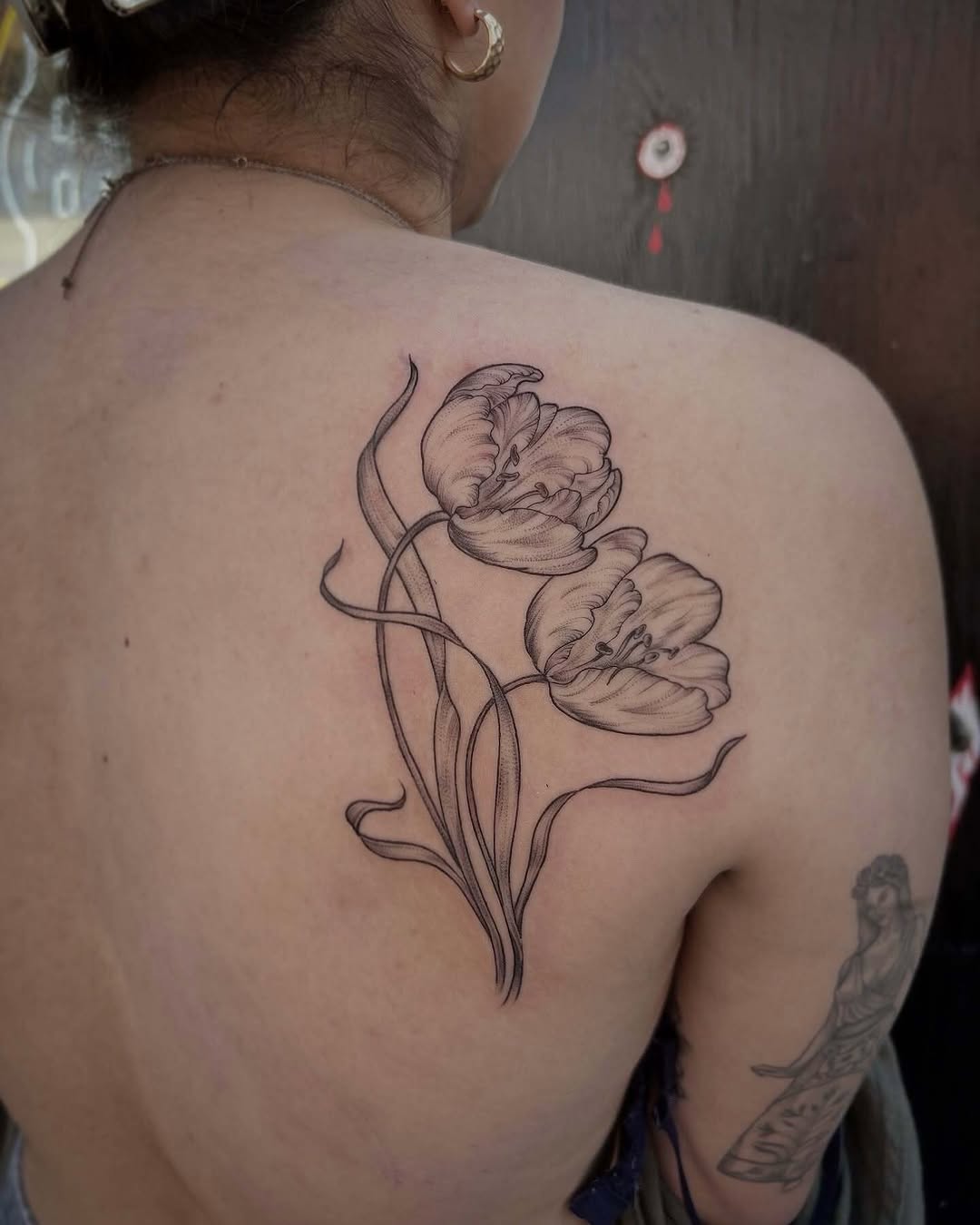 Tattoo by @southpaw.stipple — fine_line, black_and_grey