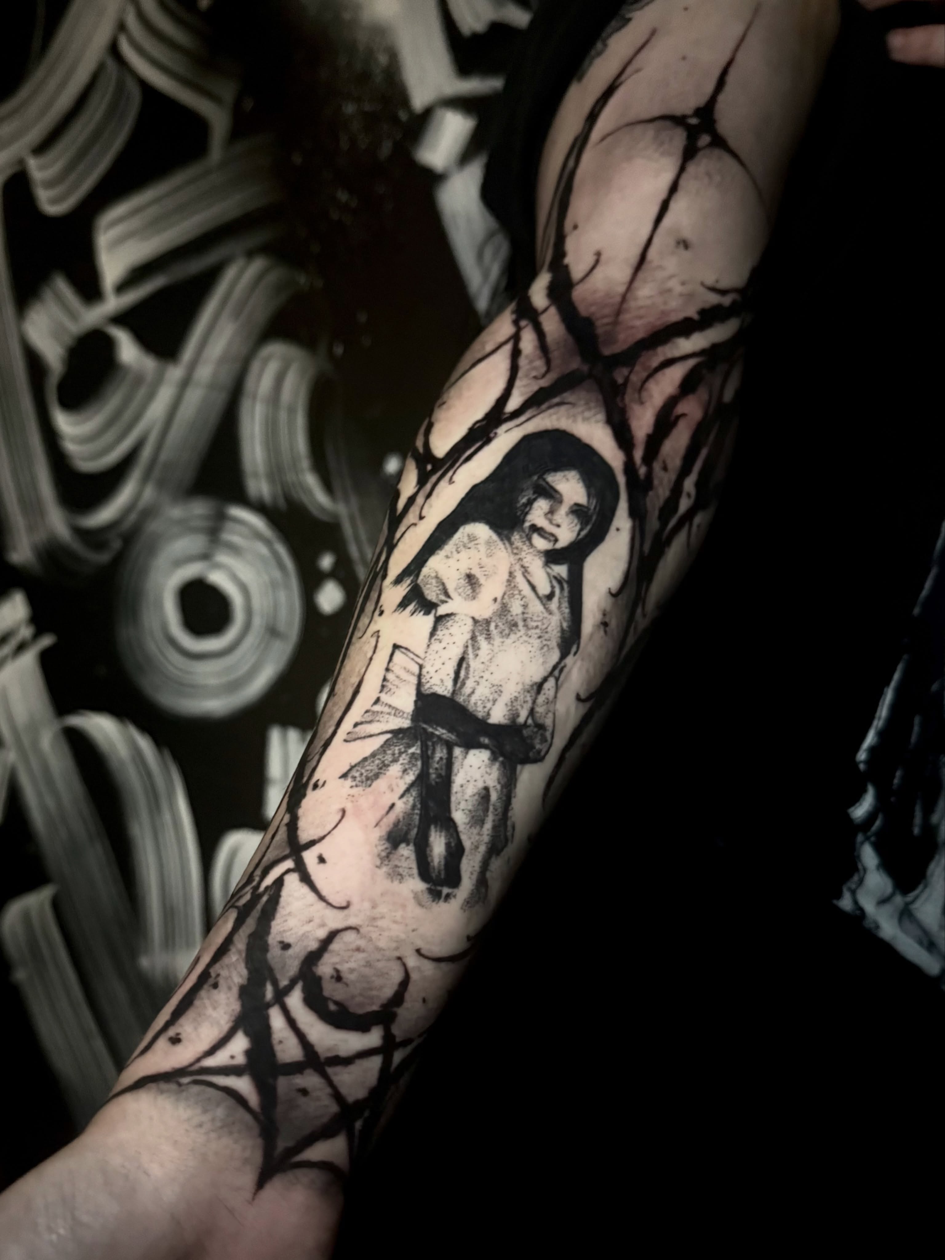 Woman dotwork tattoo on the forearm by Rory Somerville