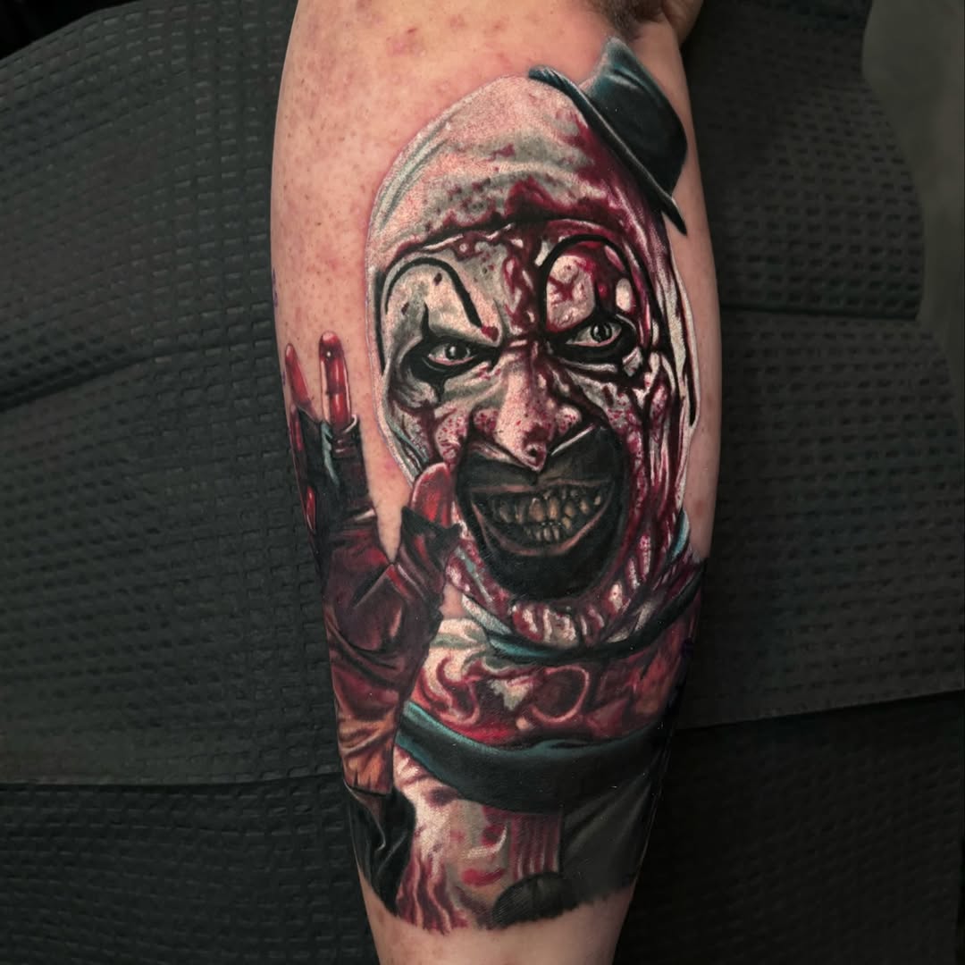 Art the Clown from Terrifier realism tattoo on the forearm by 🦇𝖀𝖙𝖆𝖍🦇, Las Vegas, Nevada