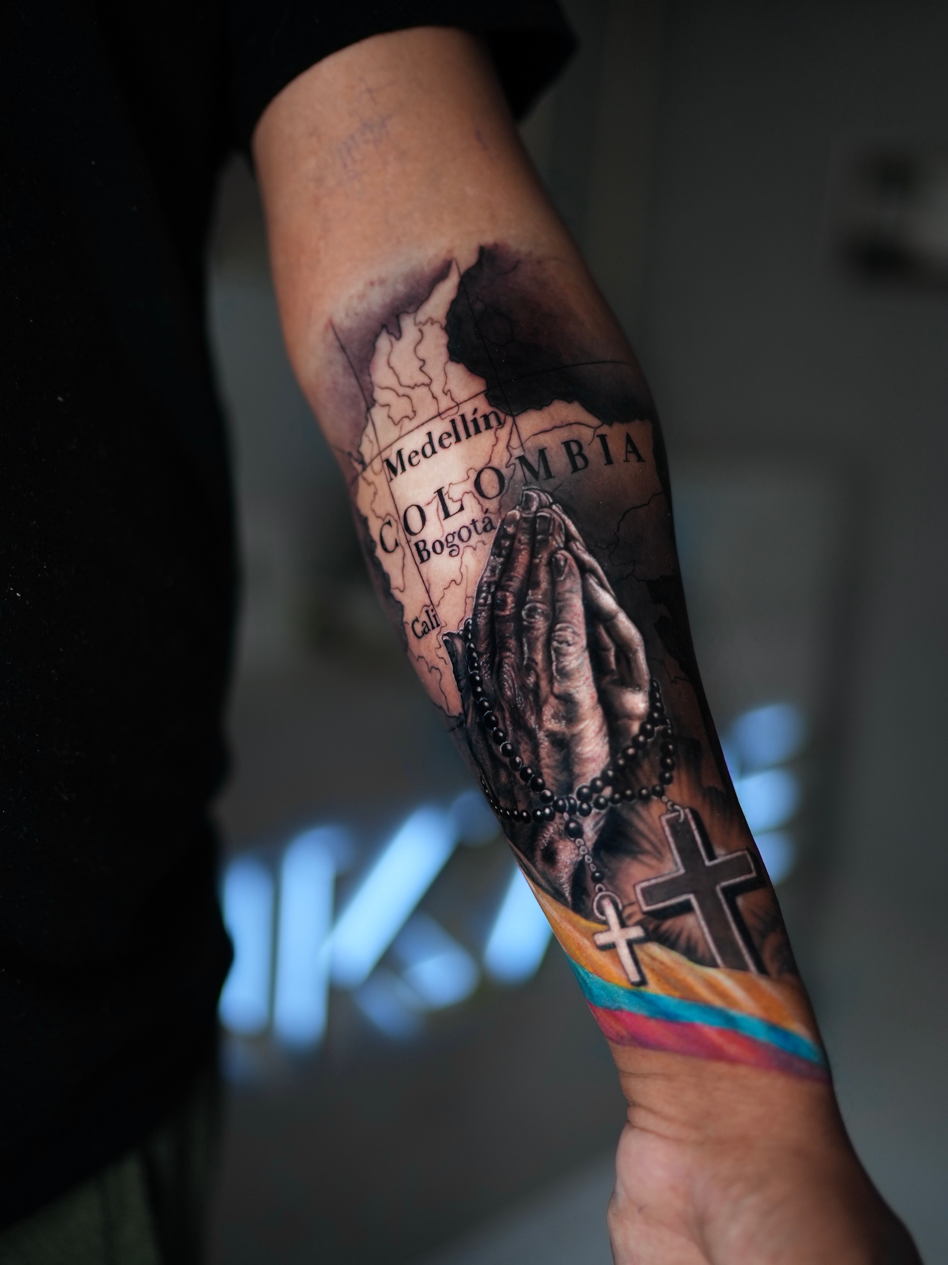 Praying hands realism tattoo on the forearm by Alberto Marrero