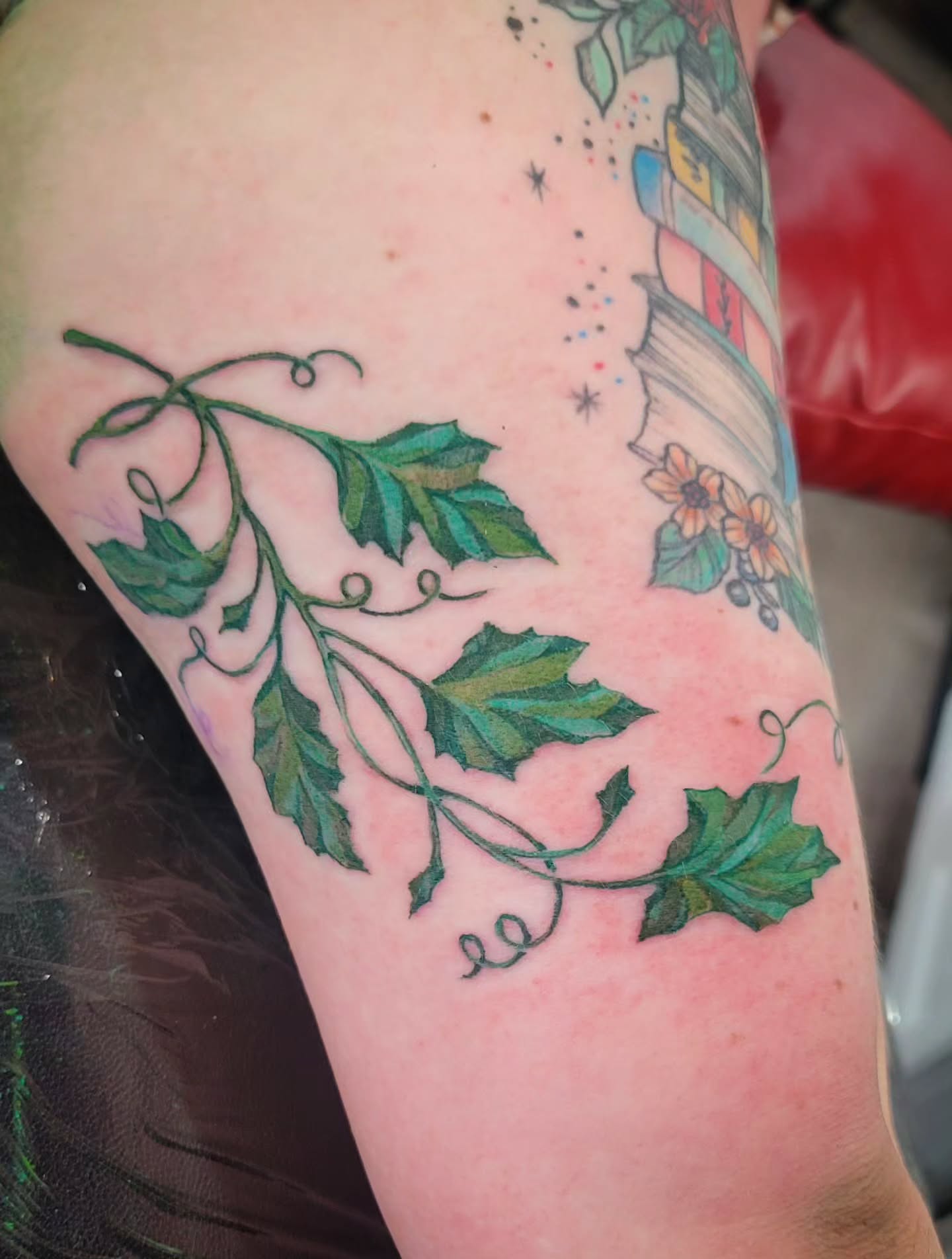 Ivy leaves watercolor tattoo on the forearm by Tricky Lake, Newfield, New Jersey