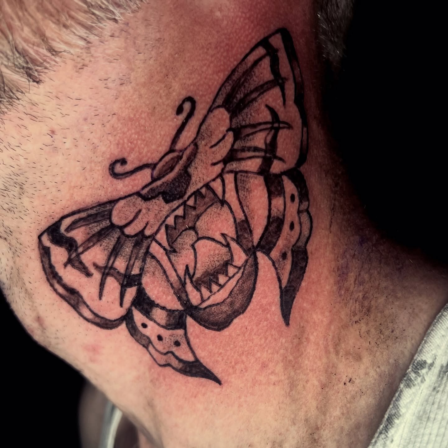 Scorpion black and grey tattoo on the neck by Evan Intveld