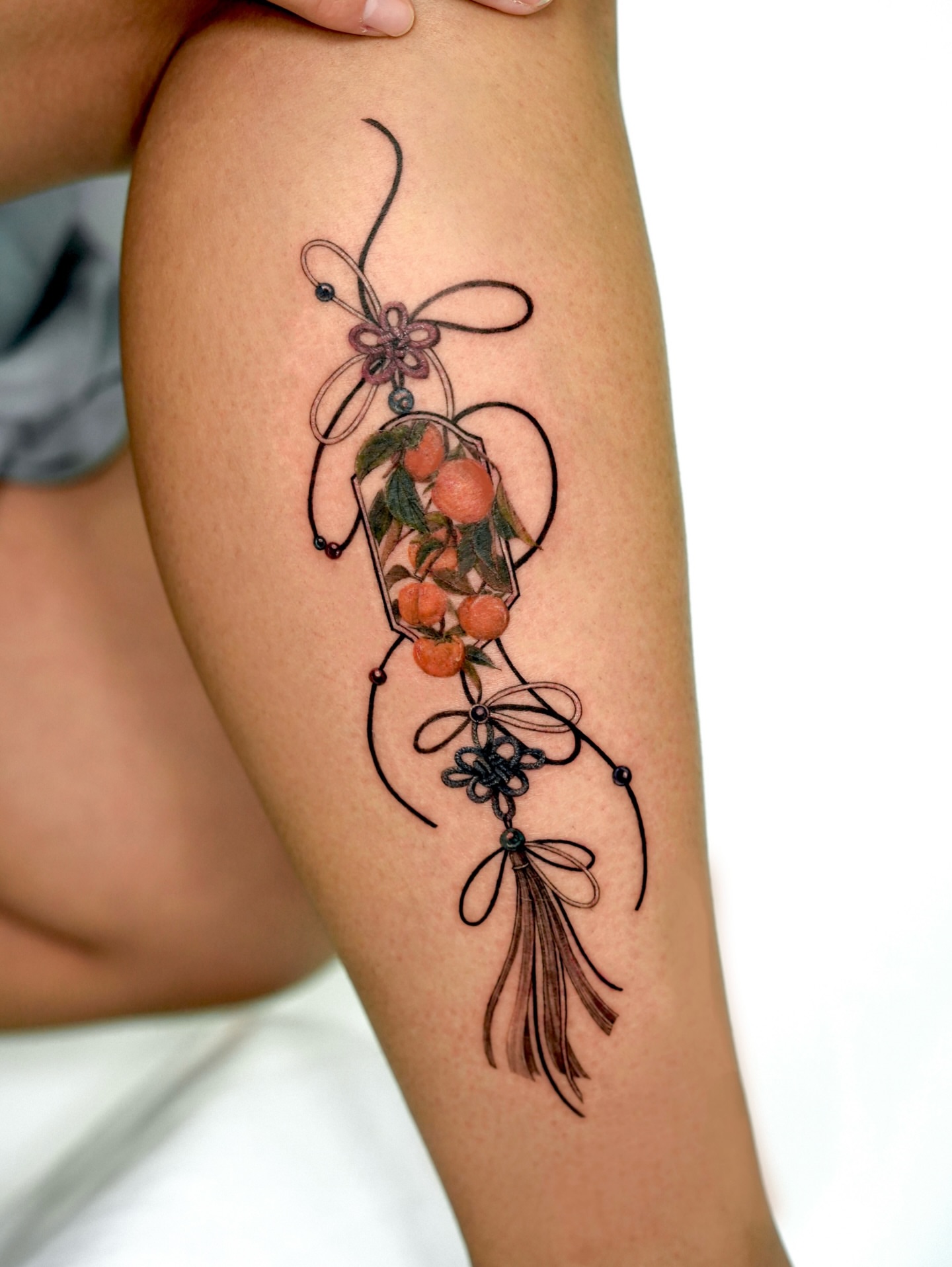 Chinese lantern fine line tattoo on the thigh by ⟡ 𝙶𝙰𝙾𝙽 ⟡ 제주타투 가온 Jejutattoo