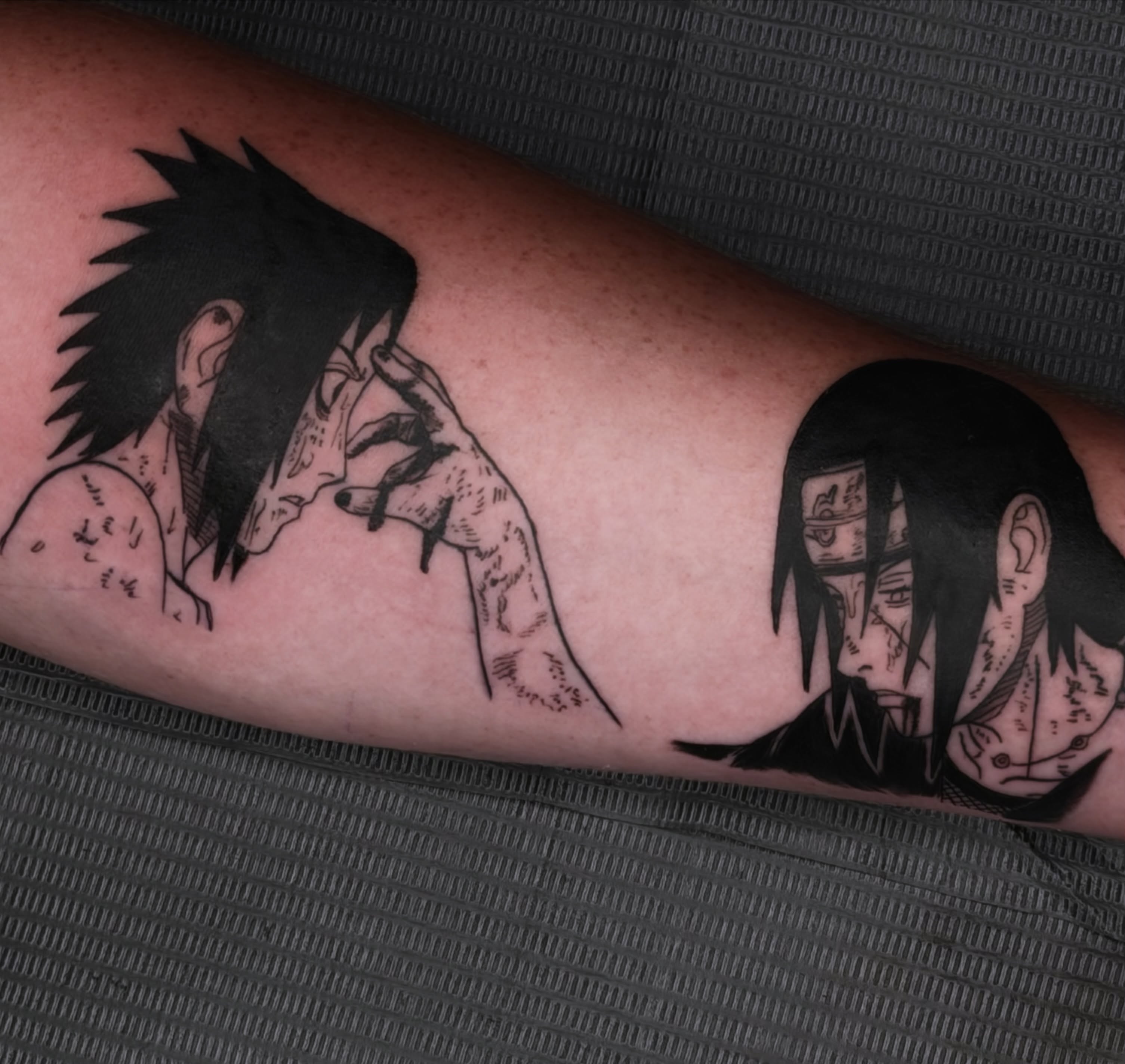 Anime characters anime tattoo on the forearm by Caleb Moul