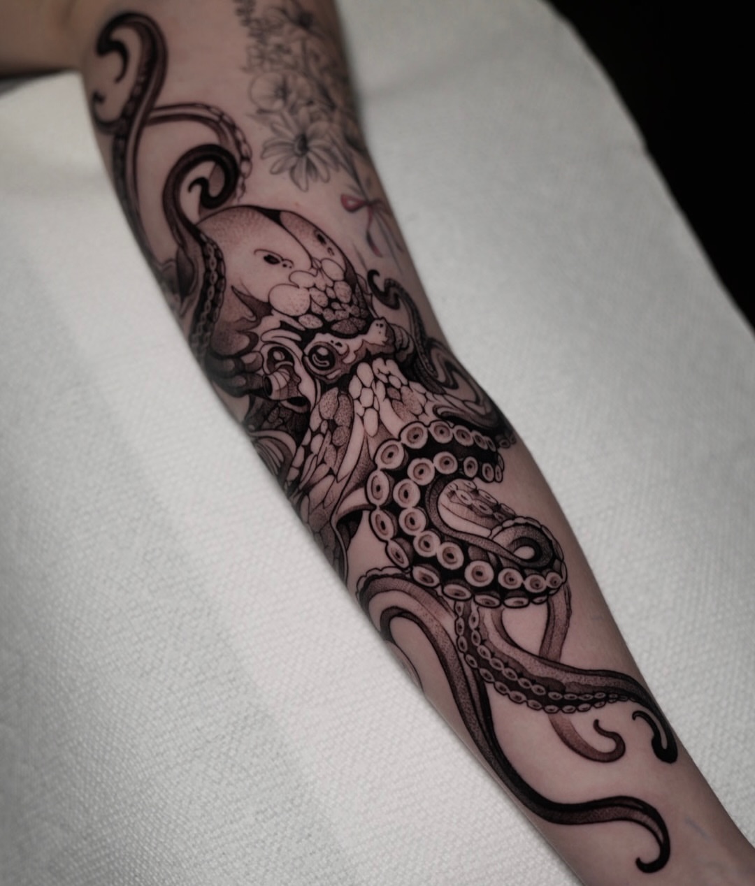 Octopus black and grey tattoo on the forearm by CRISTIAN AMORES シ
