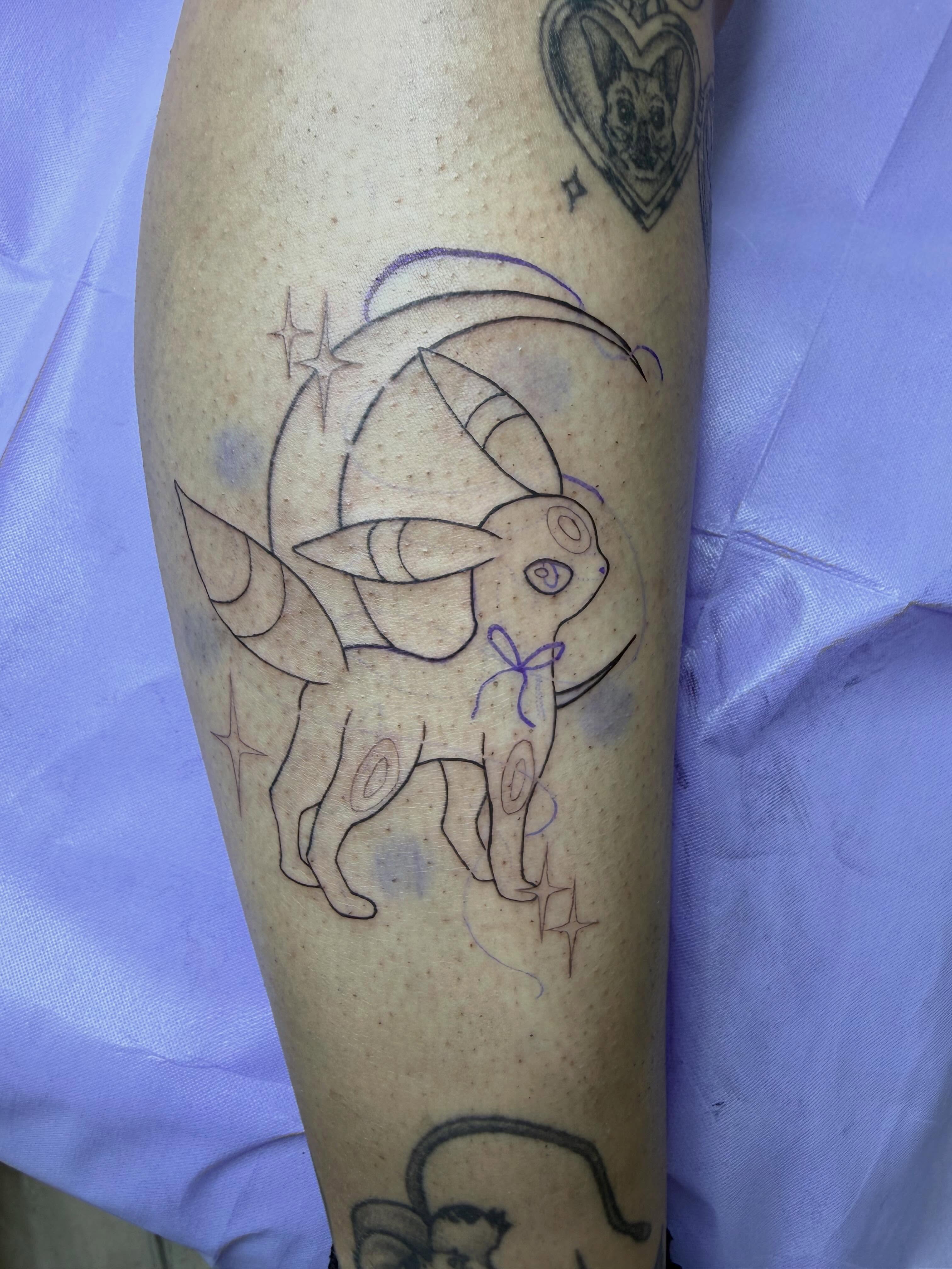 Goat with bow new school tattoo on the forearm by Krystinä