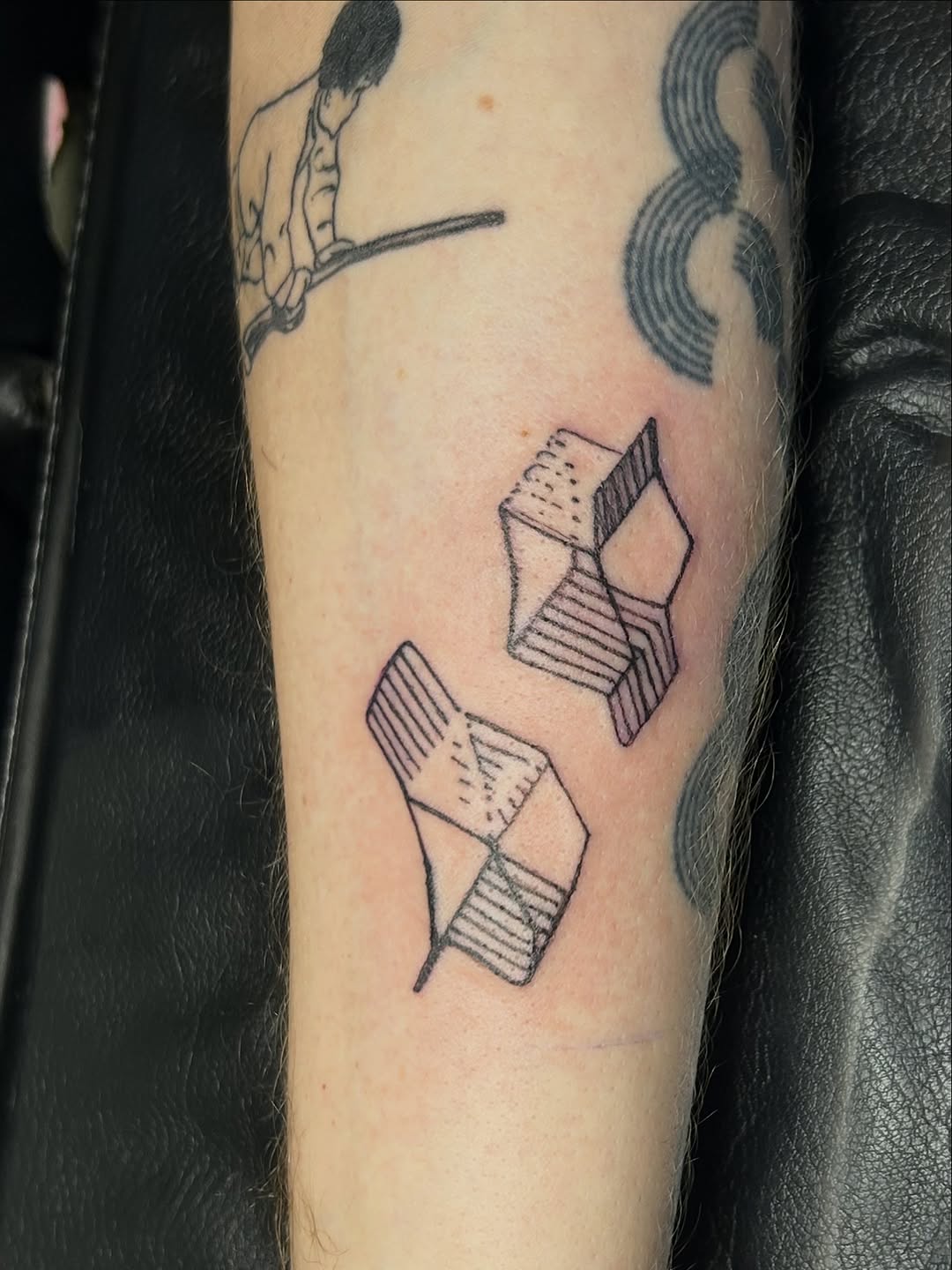 Geometric shapes minimalist tattoo on the forearm by Mattie Robinson