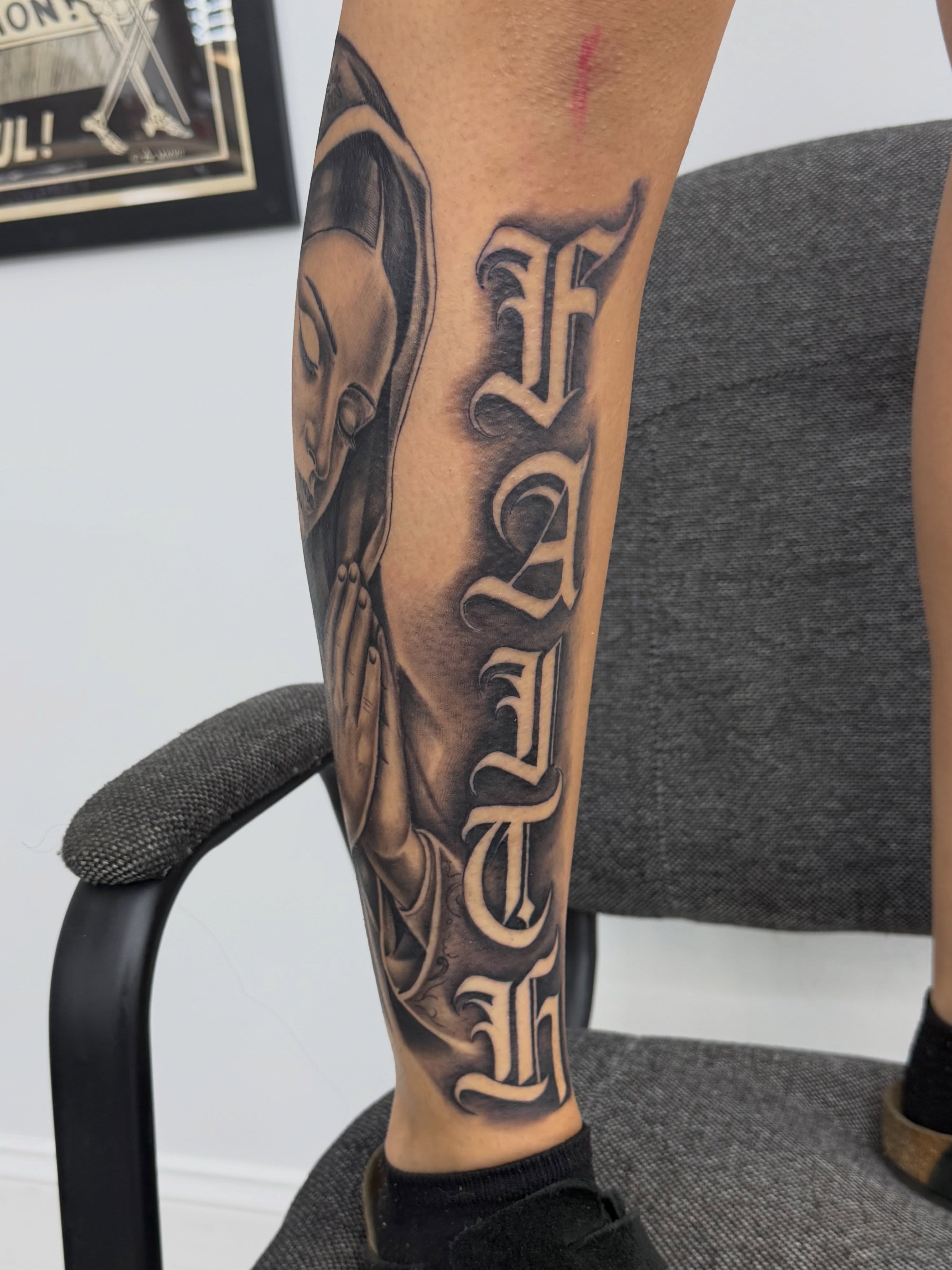 Tattoo by @real_street_tattoos — black_and_grey, realism