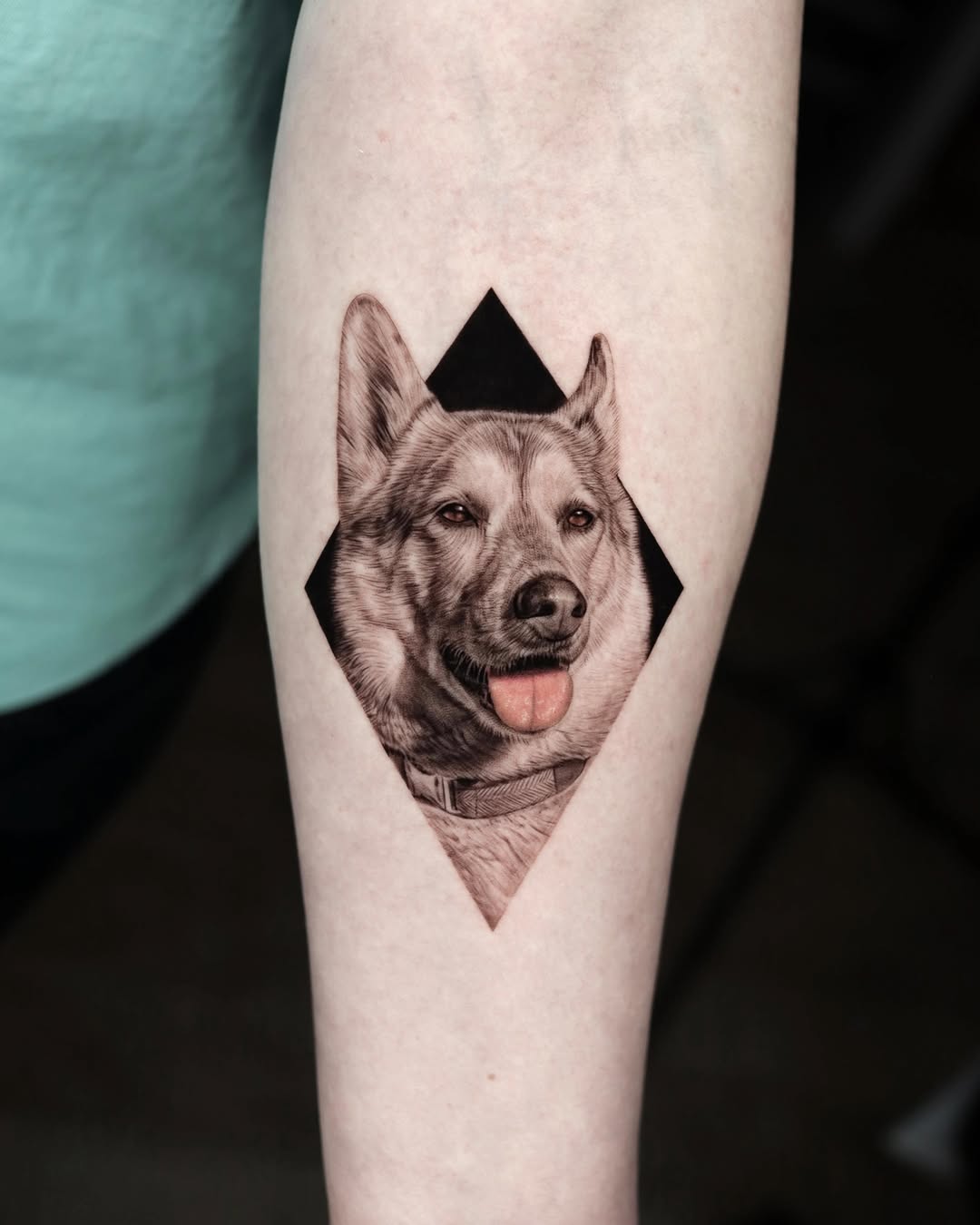 Dog portrait in a diamond frame realism tattoo on the forearm by LA Tattoo Yeono