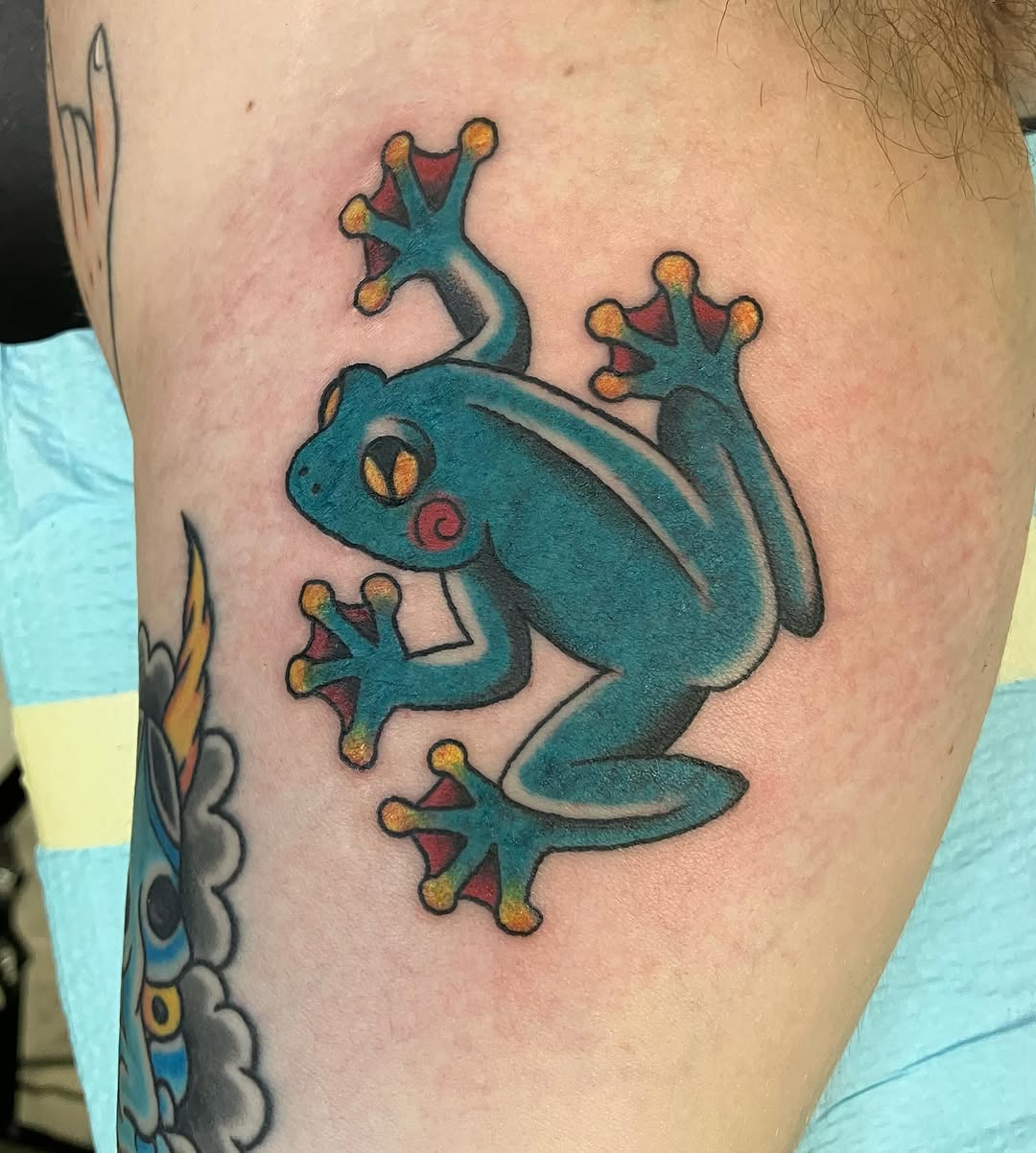 Frog American traditional tattoo on the thigh by maddie mcghee, Memphis, Tennessee