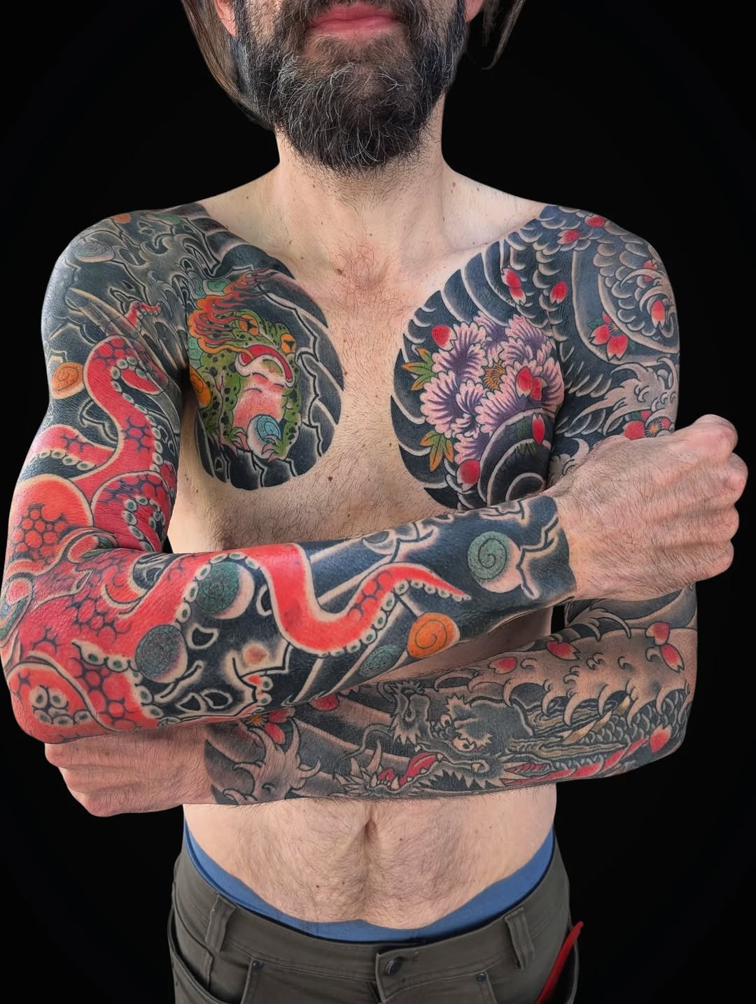 Octopus, dragon, frog, and peony Japanese tattoo on the chest by Angela Mukai