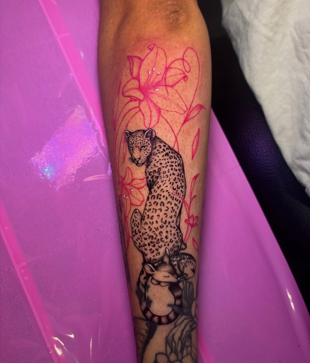 Leopard and flowers new school tattoo on the forearm by πππππππ ππππππ π¨πππππ