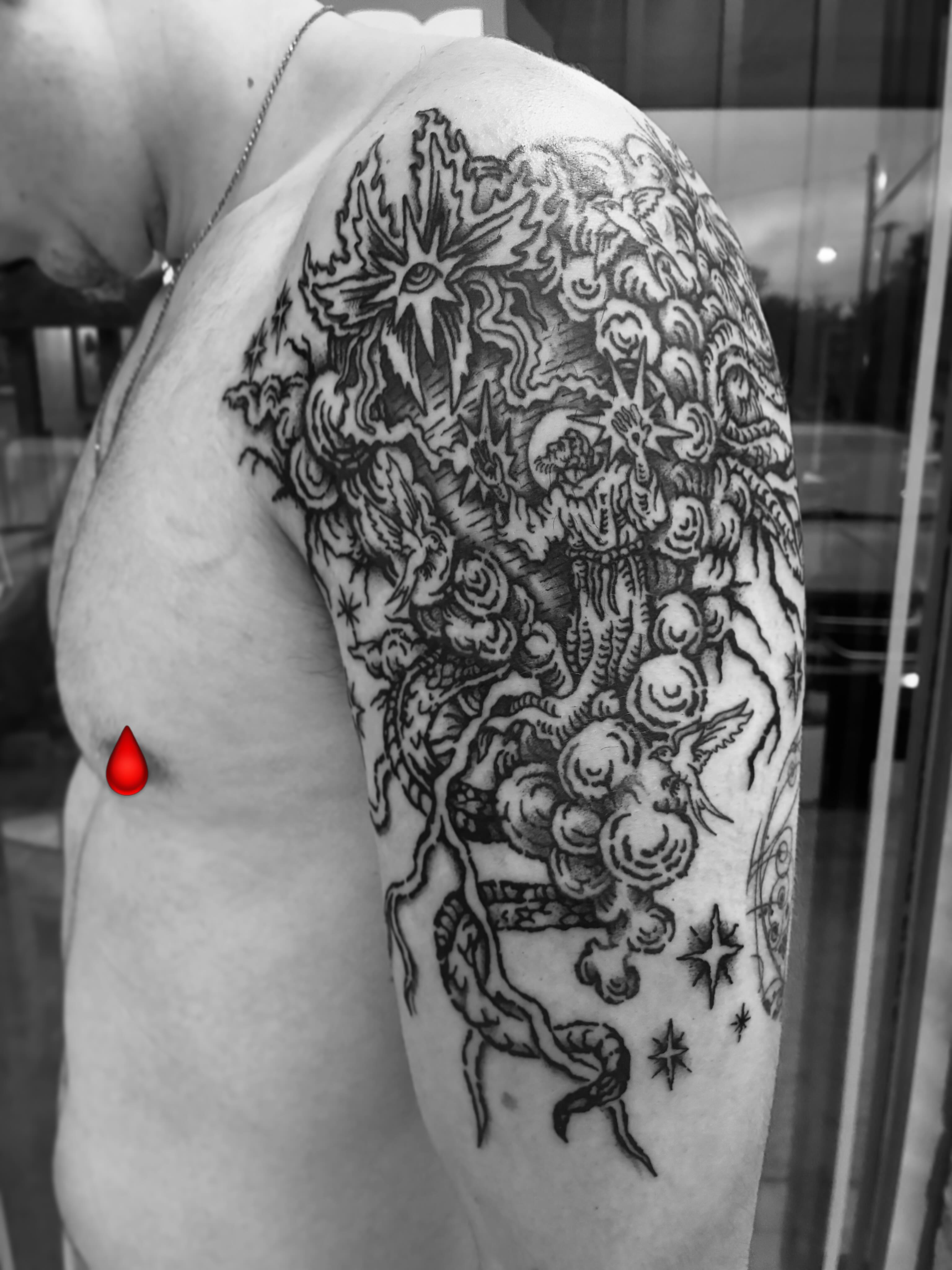 Astronomical scene black and grey tattoo on the shoulder by Zachary R Bobkoff