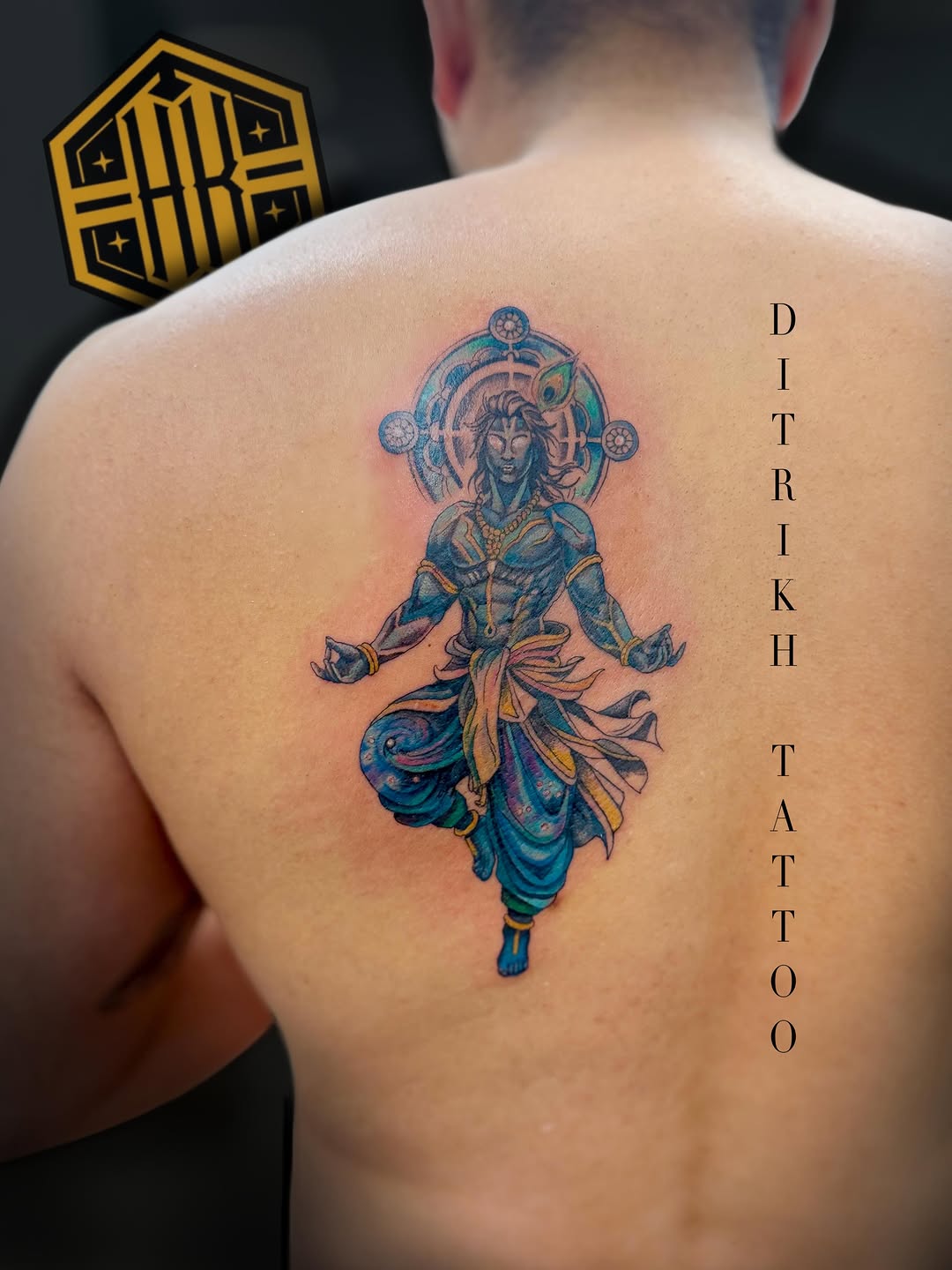 Lord Krishna tattoo on the back by KET, Calgary, Alberta