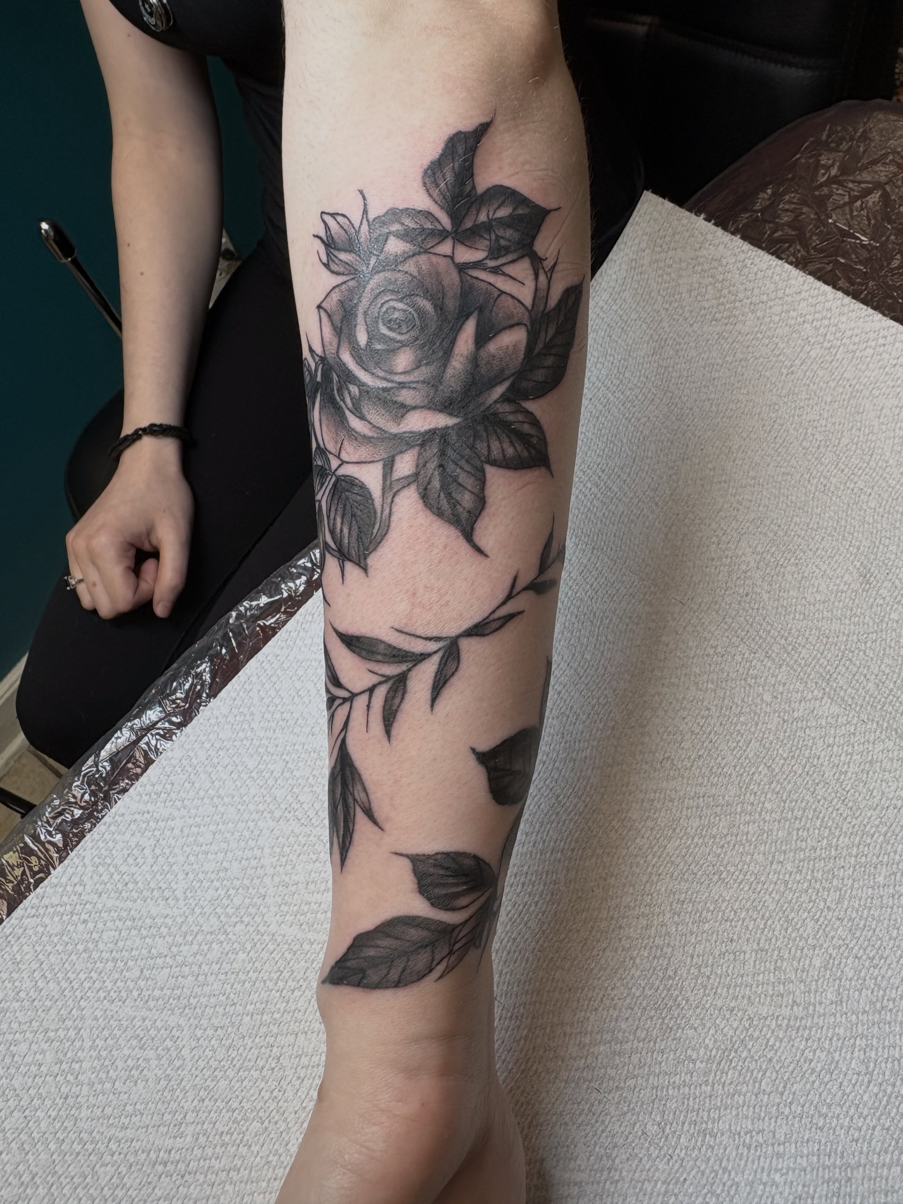 Rose black and grey tattoo on the forearm by ⋆.˚ ☾ .⭒˚ alaina