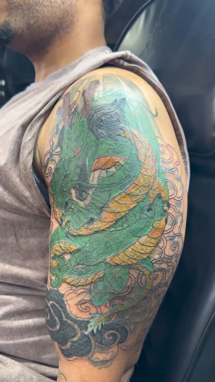Dragon tattoo on arm Japanese tattoo on the upper arm by Jones Eric