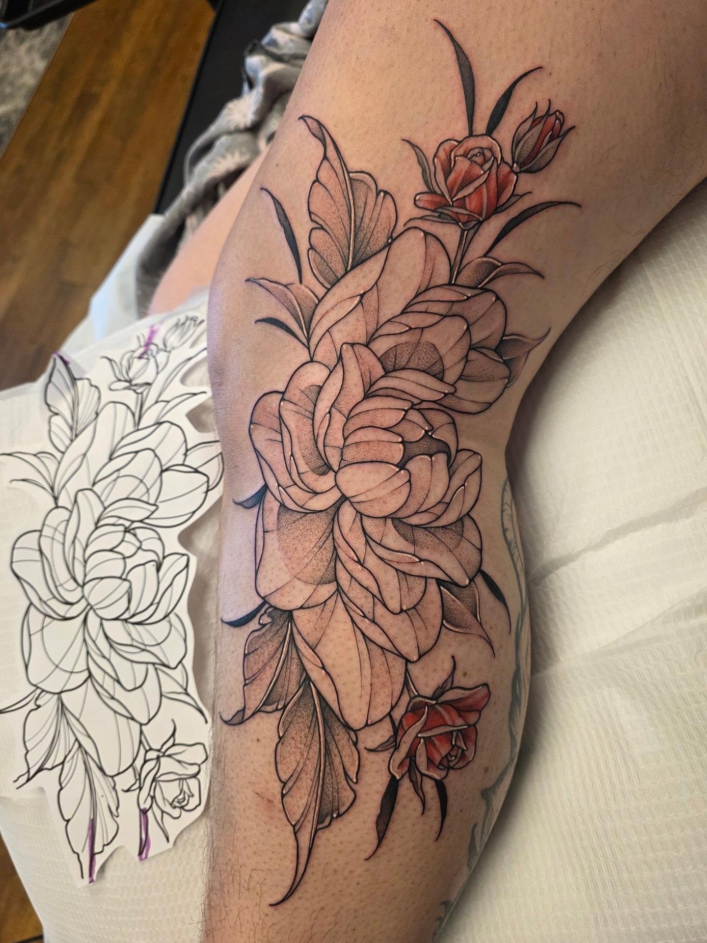 Roses black and grey tattoo on the thigh by Dani Bond