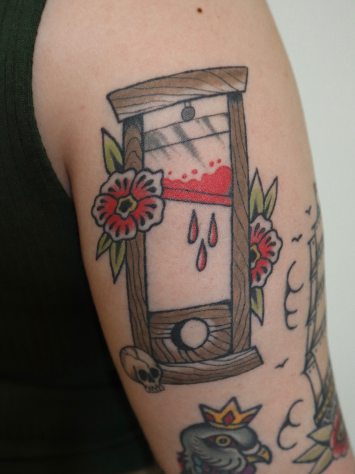 Hourglass with blood American traditional tattoo on the forearm by Kate Ortiz