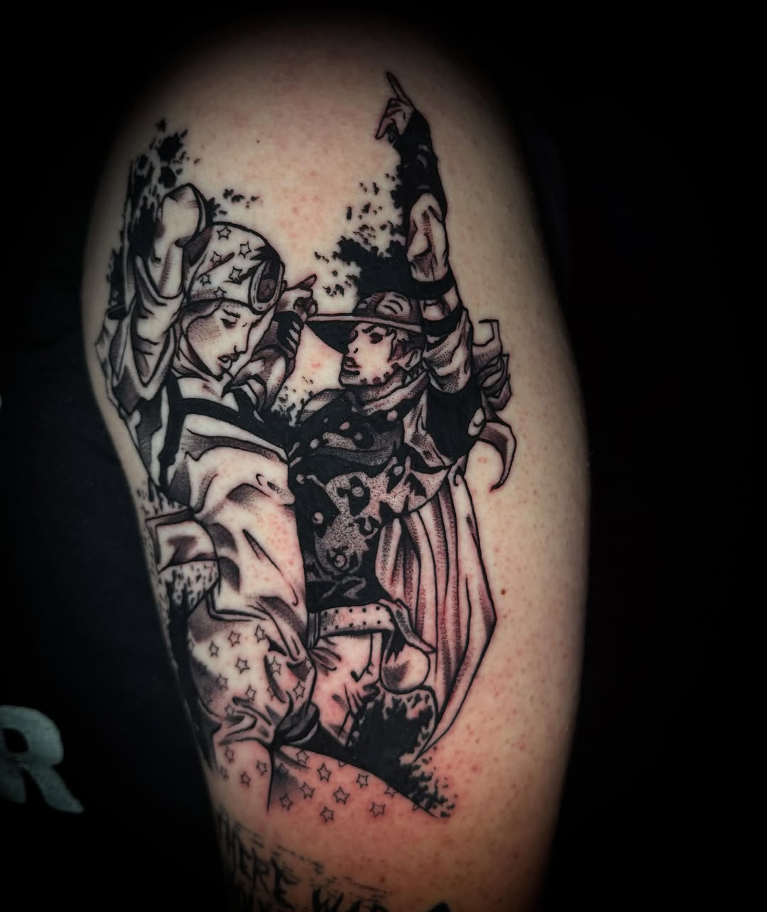 Dueling figures black and grey tattoo on the upper arm by Savannah Duff