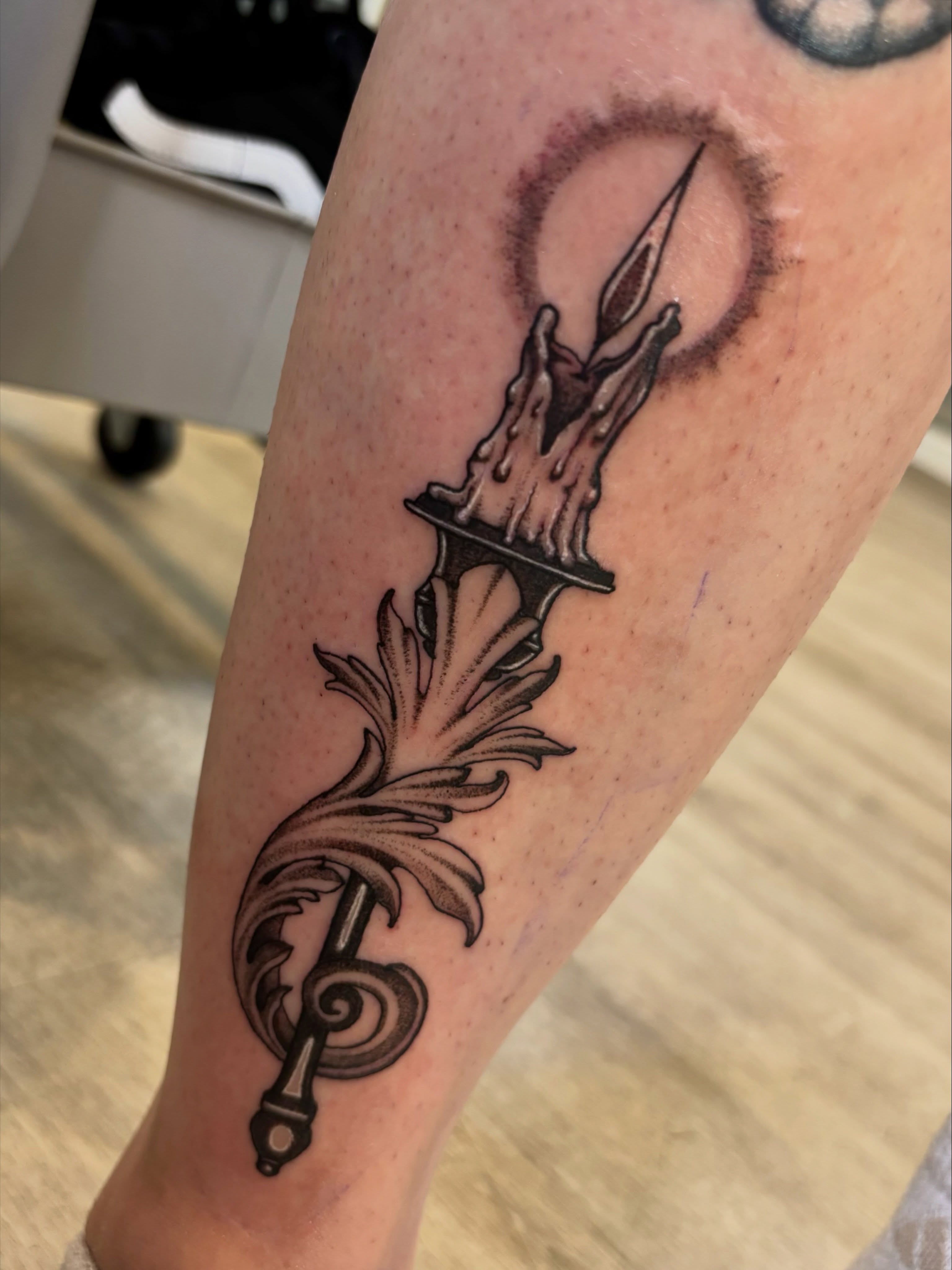 Pen and feather black and grey tattoo on the forearm by Tara, Exeter, Pennsylvania