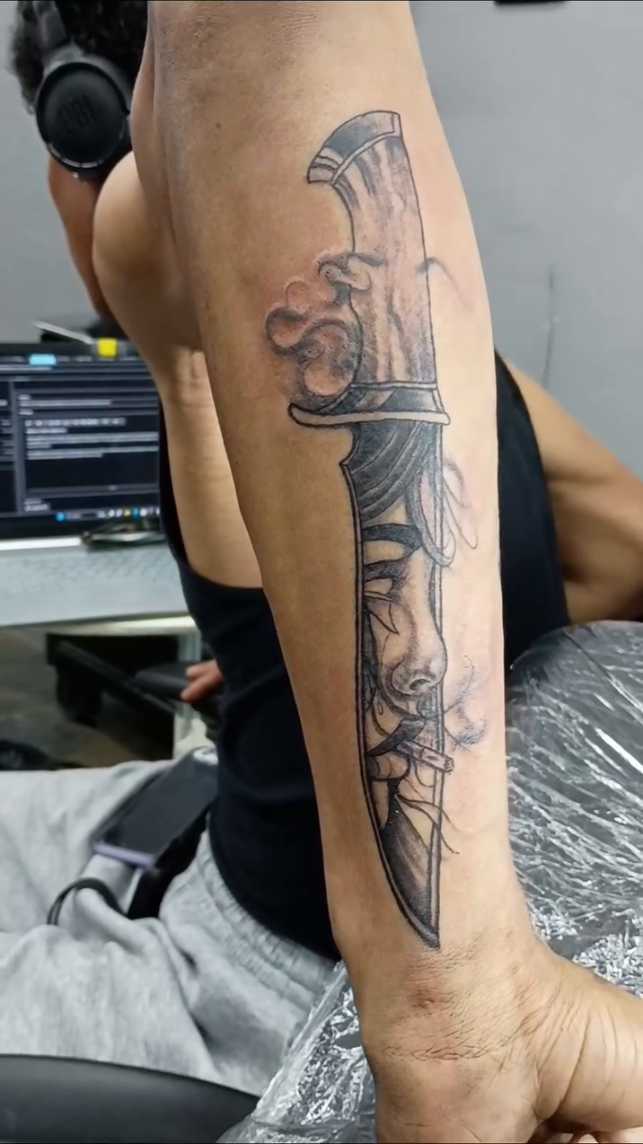 Realism tattoo on the forearm by Shadows Tattoos