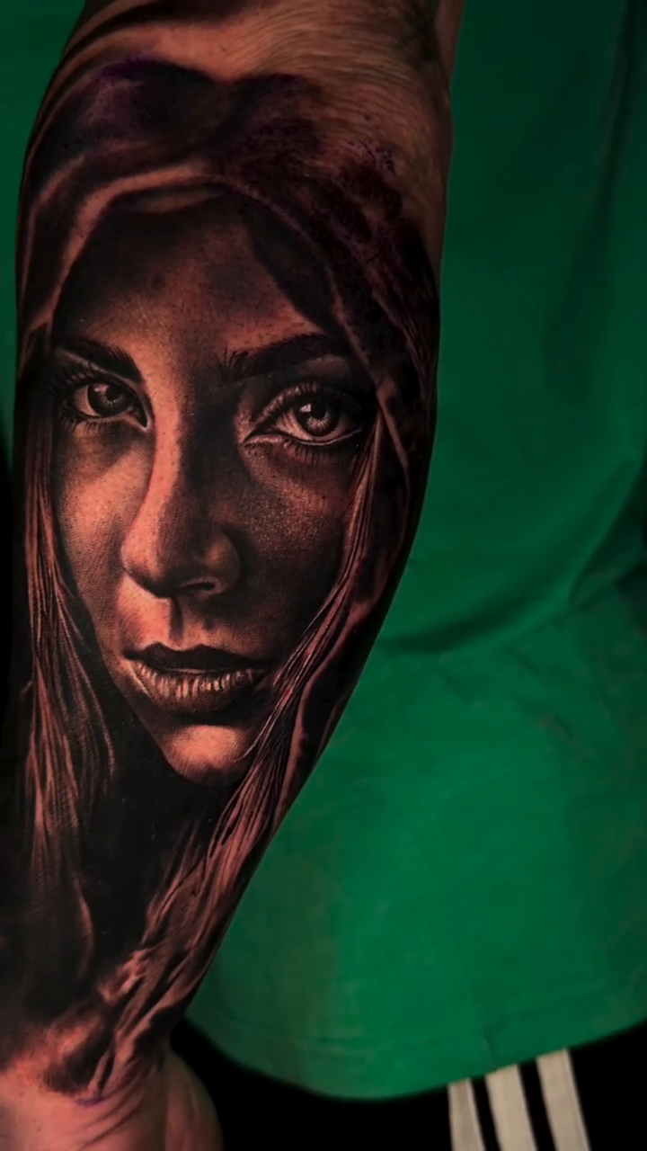 Portrait of a woman Chicano tattoo on the upper arm by T, Saugus, Massachusetts