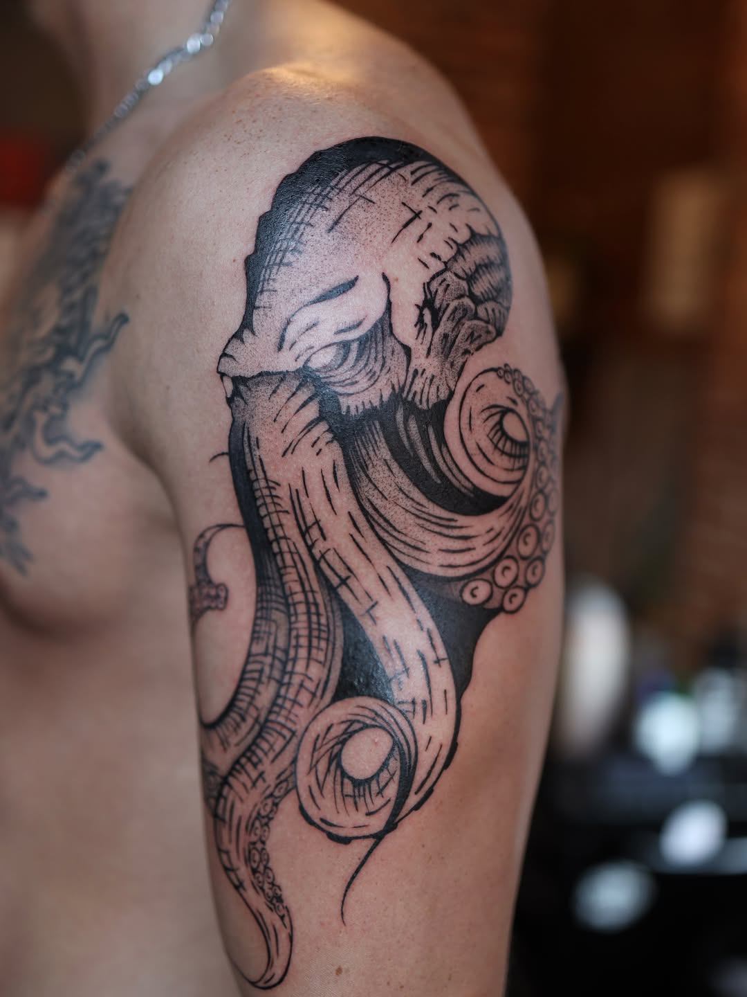 Octopus realism tattoo on the shoulder by morgan purcey