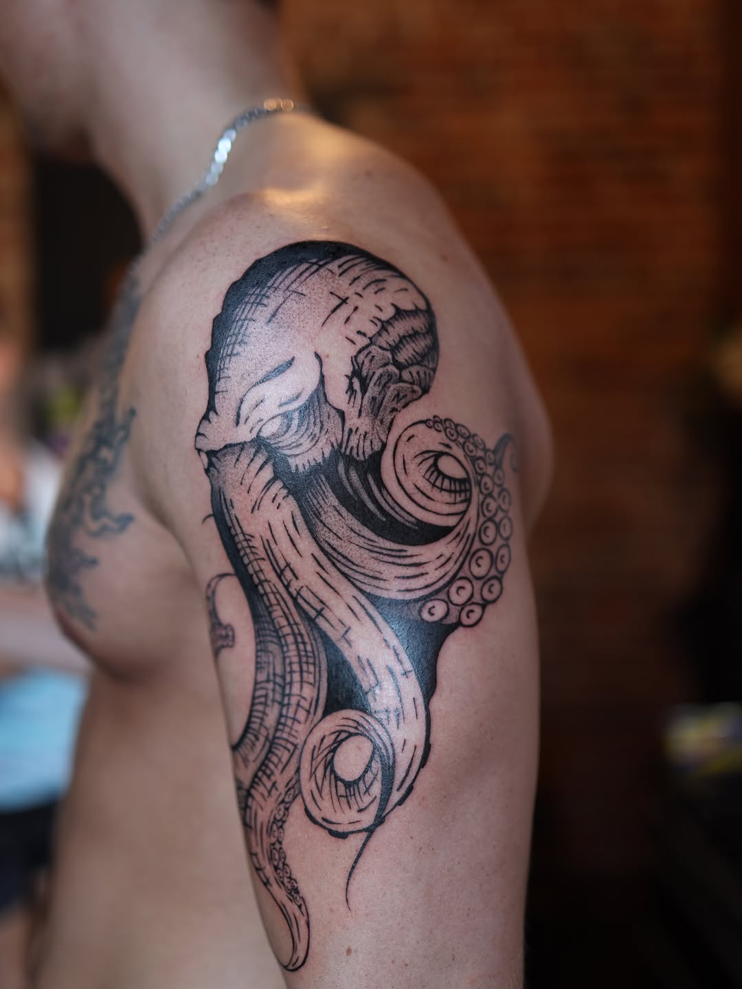 Octopus realism tattoo on the shoulder by morgan purcey