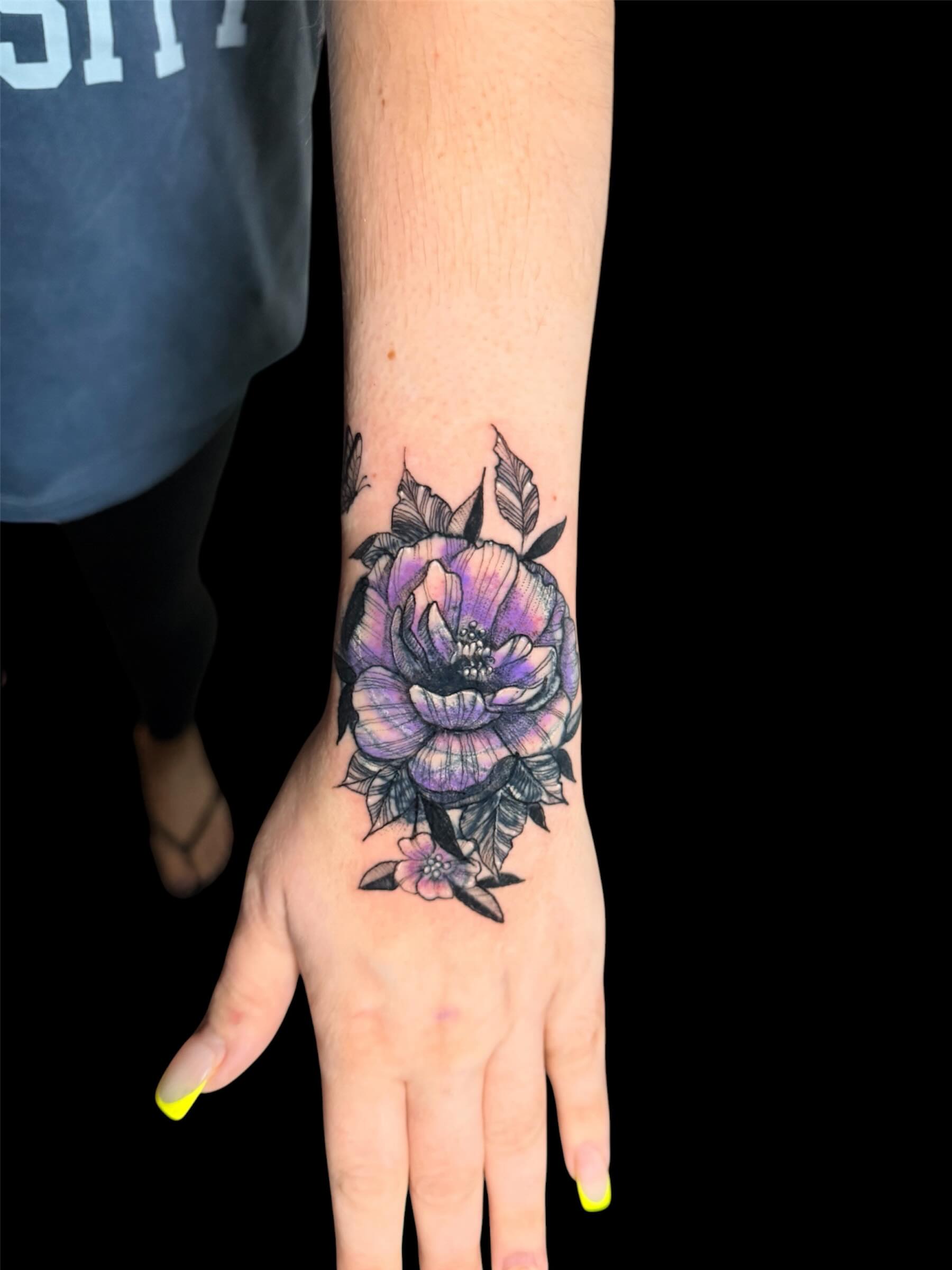 Flower realism tattoo on the hand by Gabrielle Frelak, York, Pennsylvania