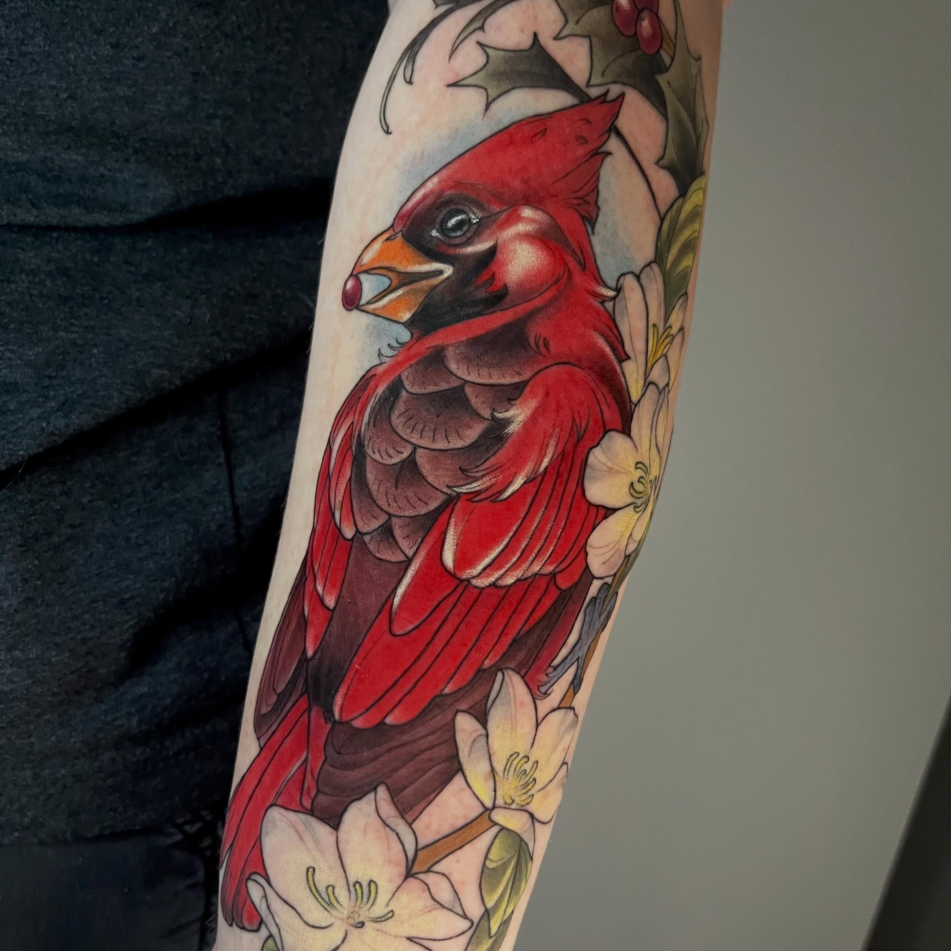 Cardinal bird realism tattoo on the forearm by Cassandra
