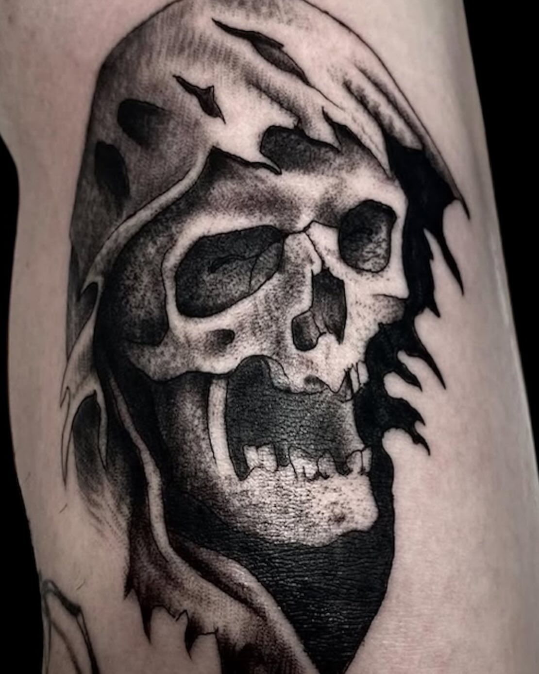 Skull realism tattoo on the forearm by Cody Glenn