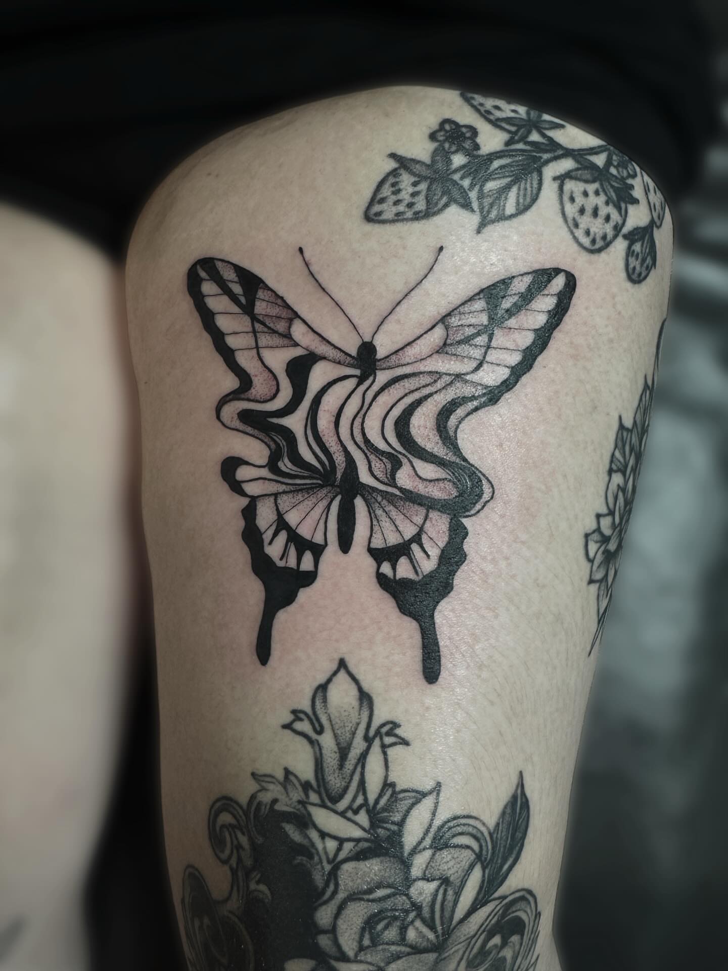 Butterfly black and grey tattoo on the thigh by Kelsey 🖤 Tattoo Artist, Waterford Township