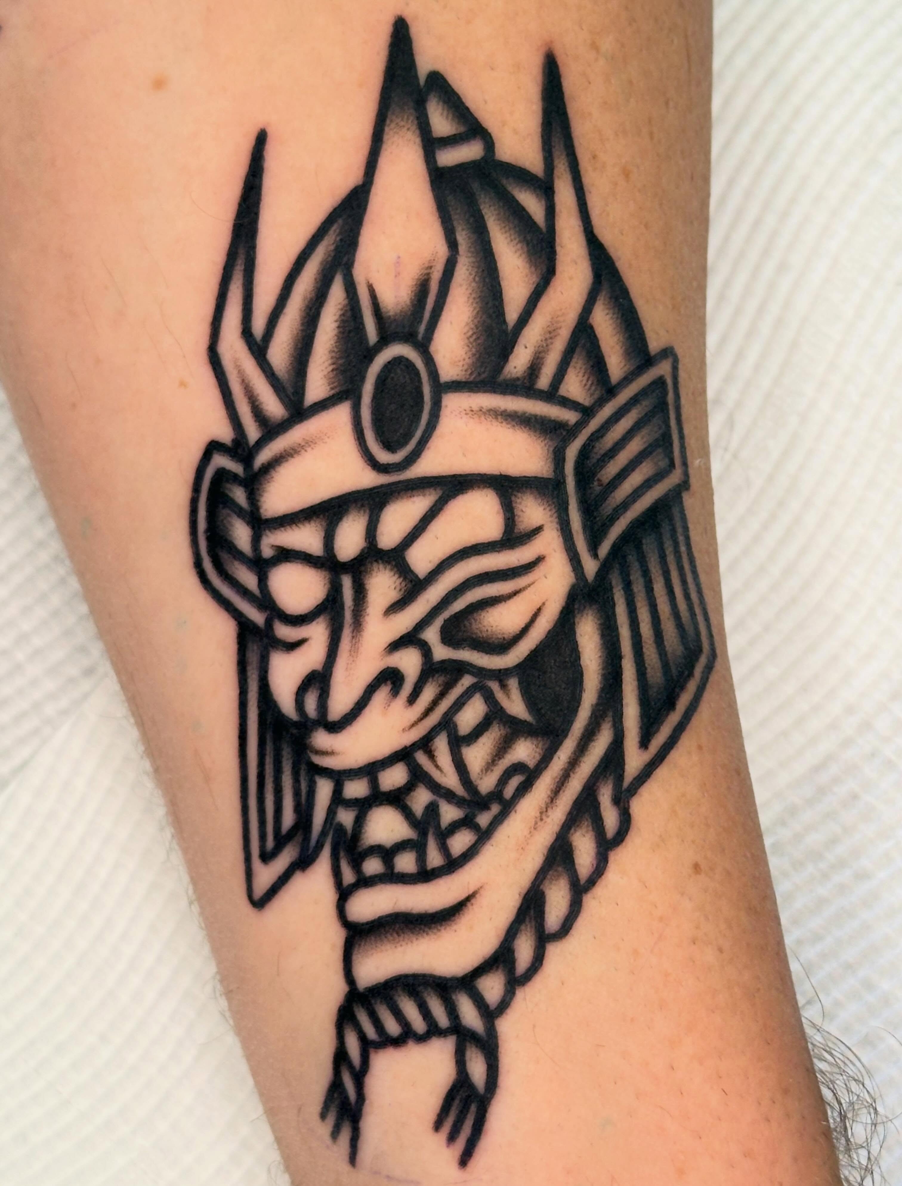 Samurai mask black and grey tattoo on the forearm by 쿤타